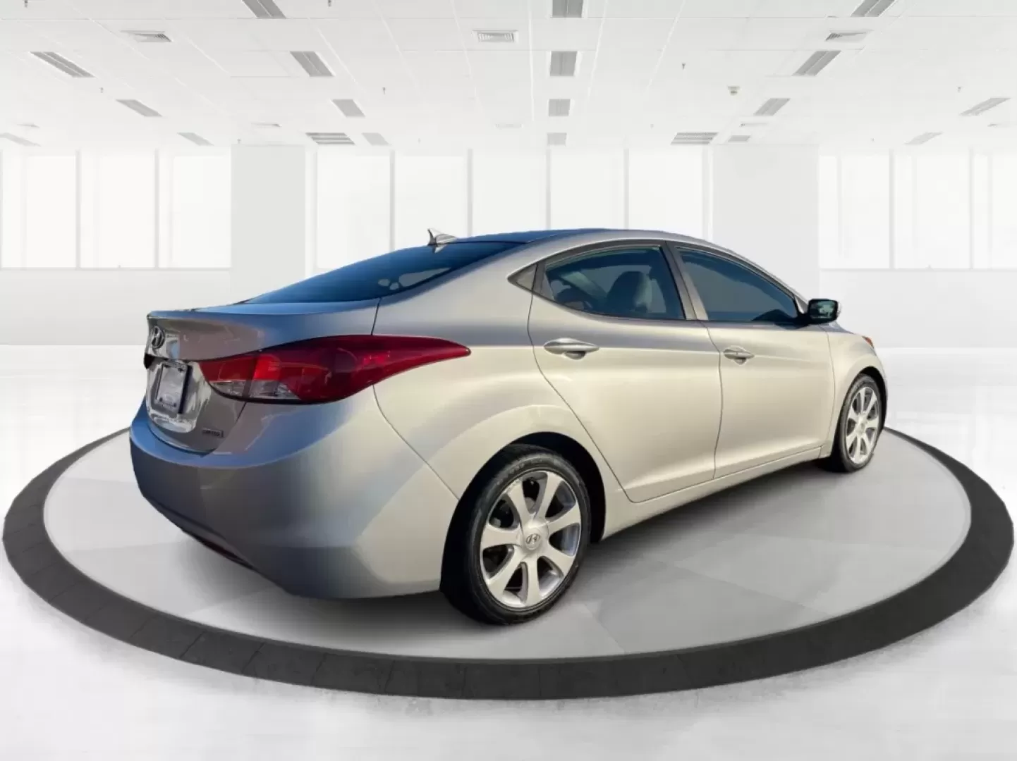 2013 Hyundai Elantra Limited (5NPDH4AE8DH) with an 1.8L I-4 DOHC engine, located at 1099 N County Rd 25A , Troy, OH, 45373, (937) 908-9800, 40.057079, -84.212883 - Elevate your daily commute and family adventures with the versatile and stylish 2013 Hyundai Elantra Limited, available now at Advantage Car and Credit - Troy. This exceptional sedan is designed for those who appreciate a blend of comfort, efficiency, and advanced technology, making it an ideal choi - Photo#2