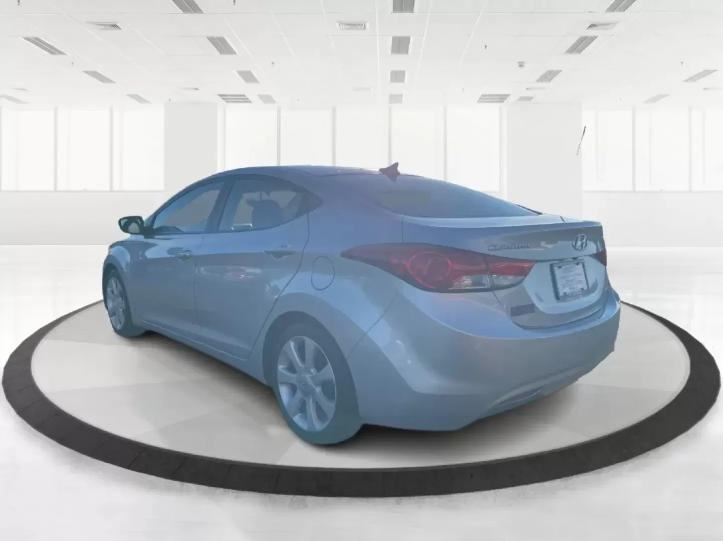 2013 Hyundai Elantra Limited (5NPDH4AE8DH) with an 1.8L I-4 DOHC engine, located at 8750 N County Rd 25A, Piqua, OH, 45356, (937) 908-9800, 40.164391, -84.232513 - Elevate your daily commute and family adventures with the versatile and stylish 2013 Hyundai Elantra Limited, available now at Advantage Car and Credit - Troy. This exceptional sedan is designed for those who appreciate a blend of comfort, efficiency, and advanced technology, making it an ideal choi - Photo#4