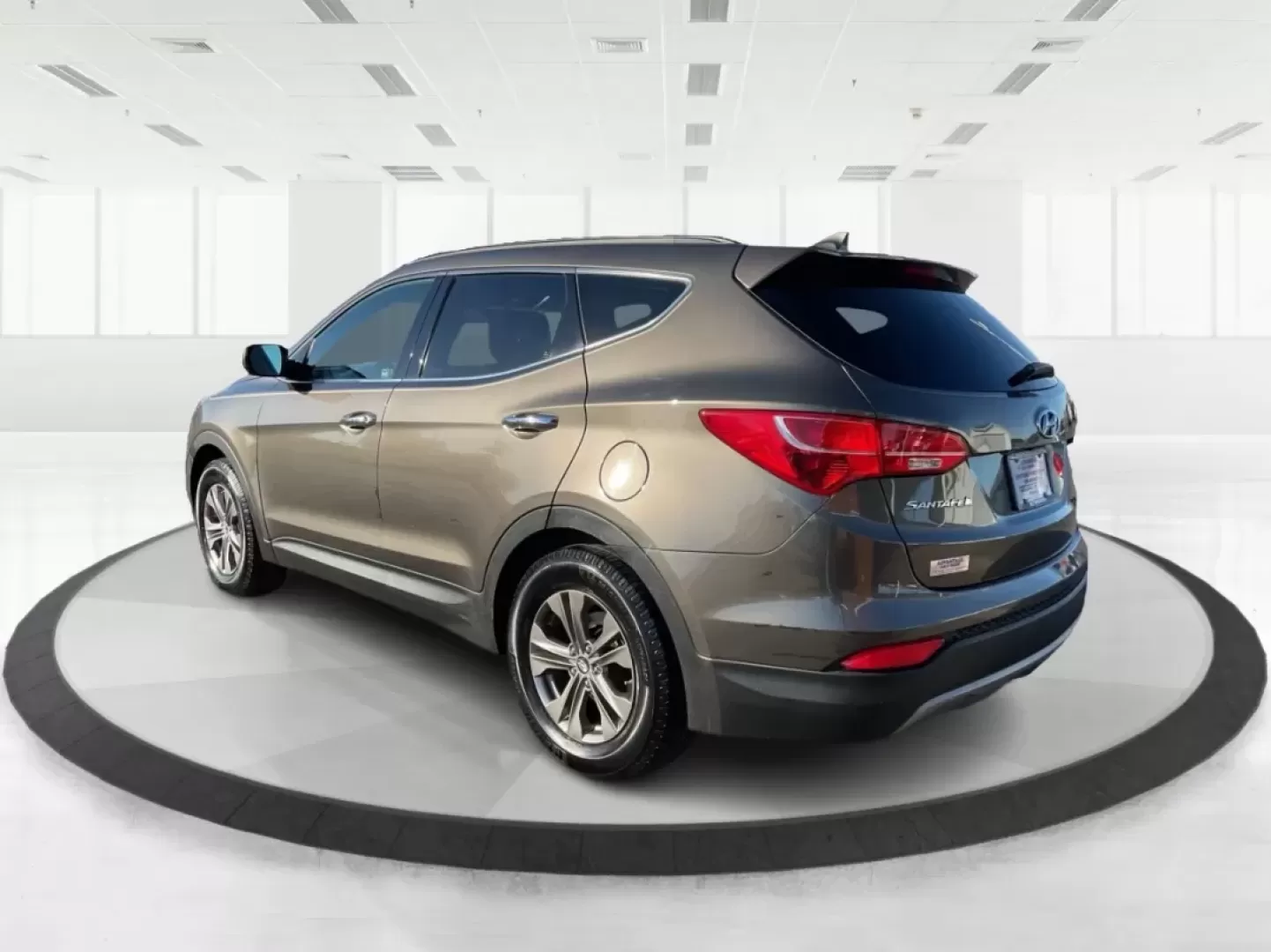 2014 Hyundai Santa Fe 2.4L (5XYZUDLBXEG) with an Theta II 2.4L I-4 gasoline direct injection engine, located at 8750 N County Rd 25A, Piqua, OH, 45356, (937) 908-9800, 40.164391, -84.232513 - **Explore New Adventures in the 2014 Hyundai Santa Fe from Advantage Car and Credit - Piqua!**<br /> <br /> Are you ready to elevate your family outings or weekend adventures? Look no further than this stunning 2014 Hyundai Santa Fe, perfect for those who crave both comfort and versatility in their - Photo#4