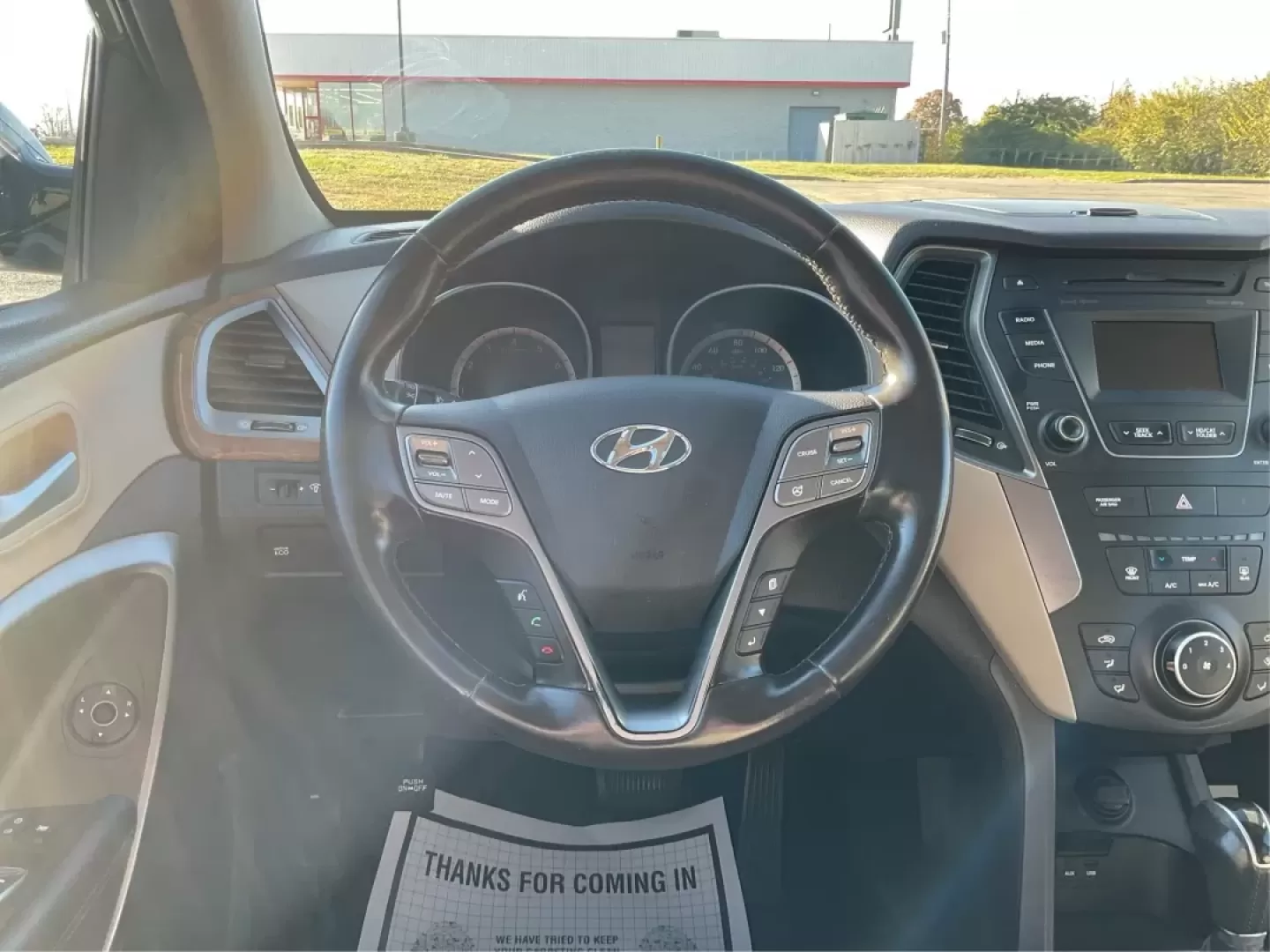 2014 Hyundai Santa Fe 2.4L (5XYZUDLBXEG) with an Theta II 2.4L I-4 gasoline direct injection engine, located at 8750 N County Rd 25A, Piqua, OH, 45356, (937) 908-9800, 40.164391, -84.232513 - **Explore New Adventures in the 2014 Hyundai Santa Fe from Advantage Car and Credit - Piqua!**<br /> <br /> Are you ready to elevate your family outings or weekend adventures? Look no further than this stunning 2014 Hyundai Santa Fe, perfect for those who crave both comfort and versatility in their - Photo#16