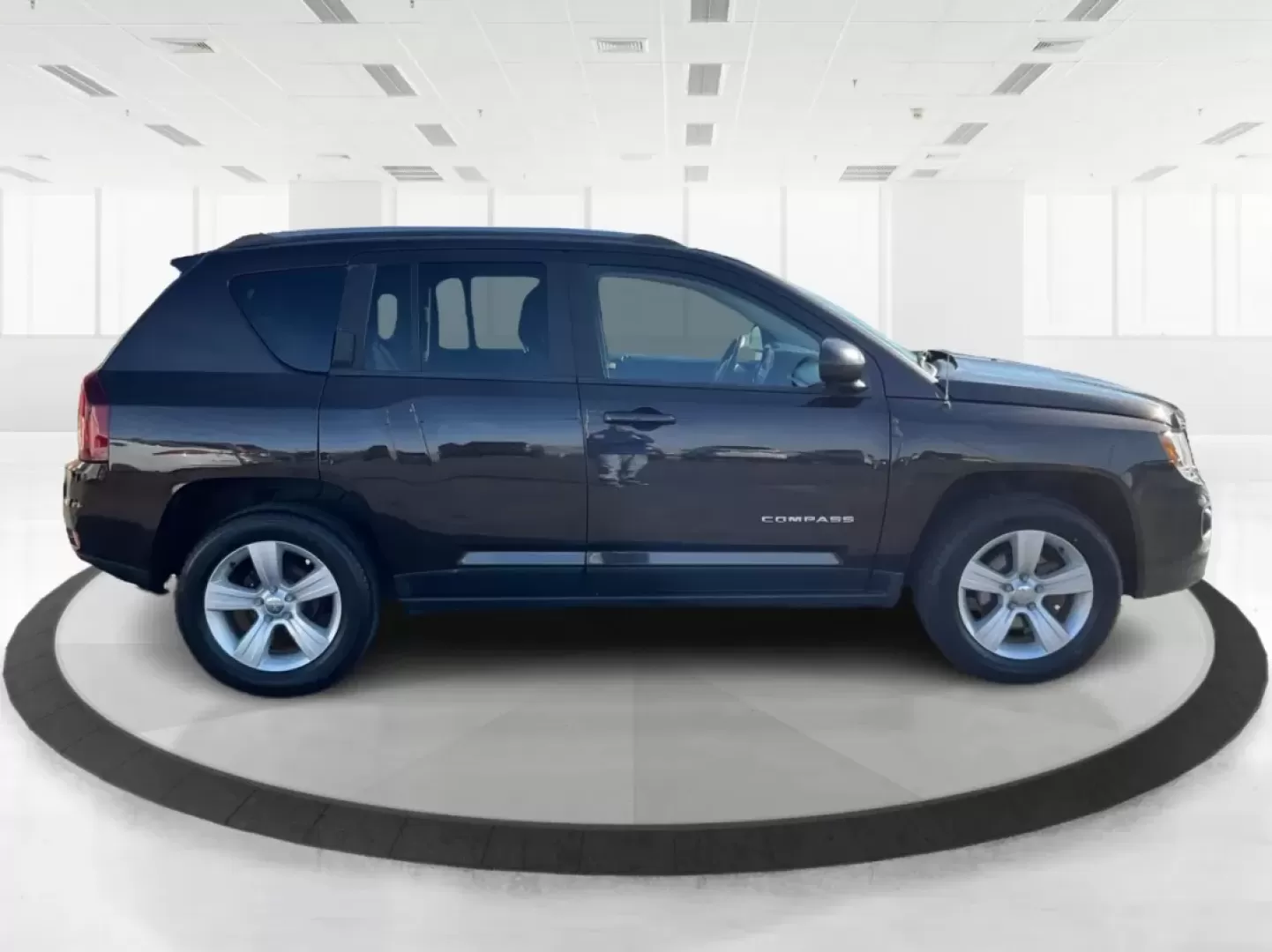 2014 Jeep Compass Sport (1C4NJDBB8ED) with an 2.4L I-4 DOHC engine, located at 1099 N County Rd 25A , Troy, OH, 45373, (937) 908-9800, 40.057079, -84.212883 - Discover the adventure-ready 2014 Jeep Compass, an SUV that's perfect for weekend getaways and daily commutes alike. Whether you're navigating the bustling streets of Troy or heading out on a family road trip to nearby attractions like the Miami County Fair, this rugged vehicle will elevate your dri - Photo#1