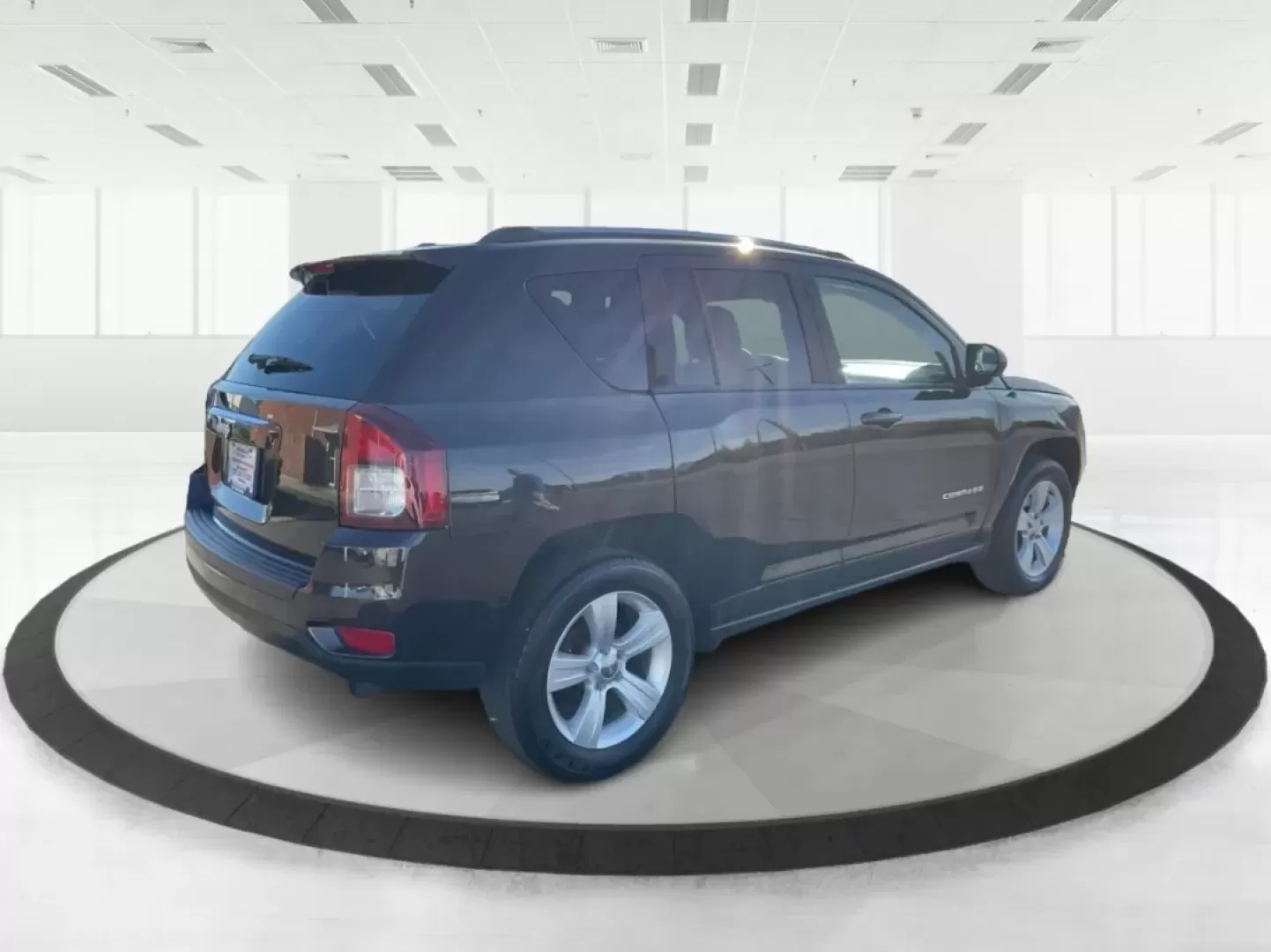 2014 Jeep Compass Sport (1C4NJDBB8ED) with an 2.4L I-4 DOHC engine, located at 1099 N County Rd 25A , Troy, OH, 45373, (937) 908-9800, 40.057079, -84.212883 - Discover the adventure-ready 2014 Jeep Compass, an SUV that's perfect for weekend getaways and daily commutes alike. Whether you're navigating the bustling streets of Troy or heading out on a family road trip to nearby attractions like the Miami County Fair, this rugged vehicle will elevate your dri - Photo#2