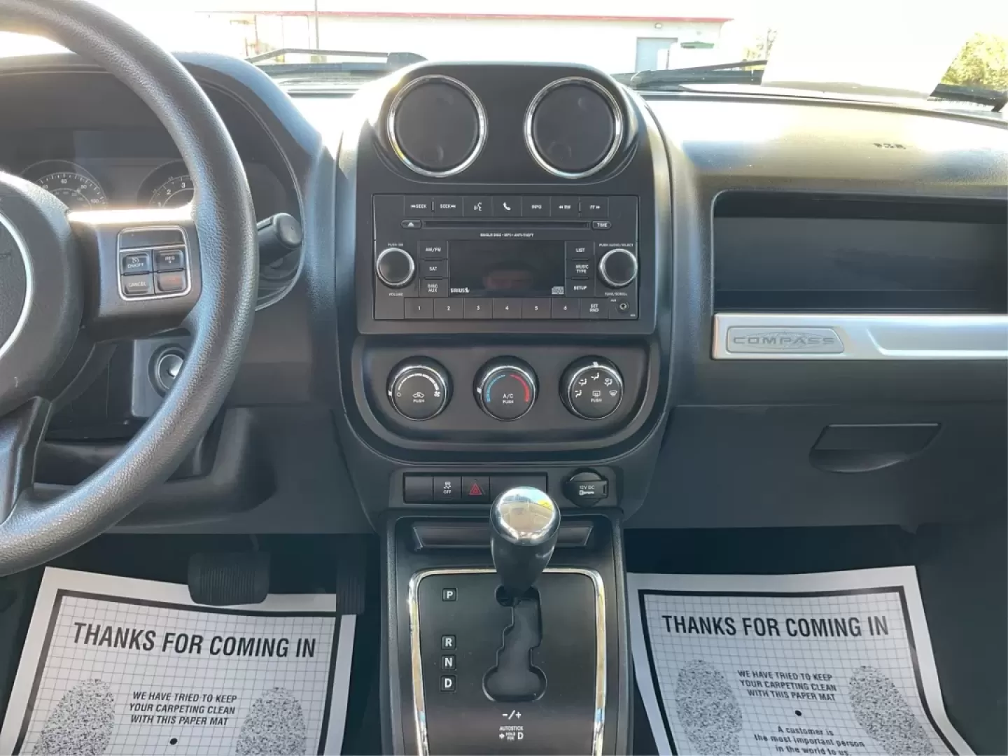 2014 Jeep Compass Sport (1C4NJDBB8ED) with an 2.4L I-4 DOHC engine, located at 1099 N County Rd 25A , Troy, OH, 45373, (937) 908-9800, 40.057079, -84.212883 - Discover the adventure-ready 2014 Jeep Compass, an SUV that's perfect for weekend getaways and daily commutes alike. Whether you're navigating the bustling streets of Troy or heading out on a family road trip to nearby attractions like the Miami County Fair, this rugged vehicle will elevate your dri - Photo#13