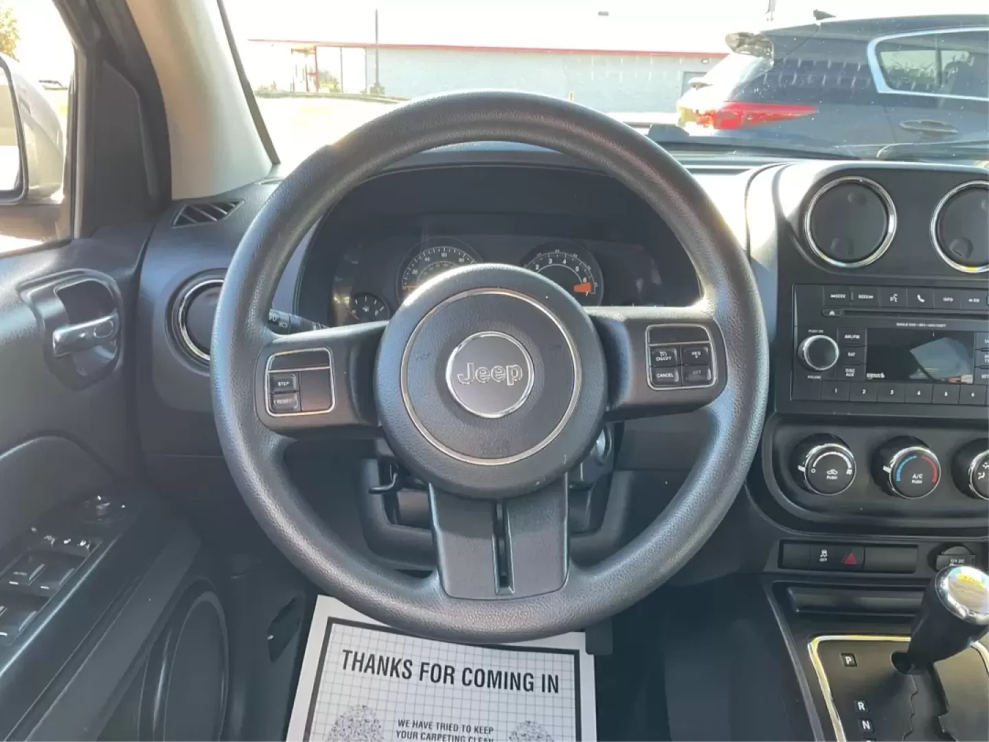 2014 Jeep Compass Sport (1C4NJDBB8ED) with an 2.4L I-4 DOHC engine, located at 1099 N County Rd 25A , Troy, OH, 45373, (937) 908-9800, 40.057079, -84.212883 - Discover the adventure-ready 2014 Jeep Compass, an SUV that's perfect for weekend getaways and daily commutes alike. Whether you're navigating the bustling streets of Troy or heading out on a family road trip to nearby attractions like the Miami County Fair, this rugged vehicle will elevate your dri - Photo#16