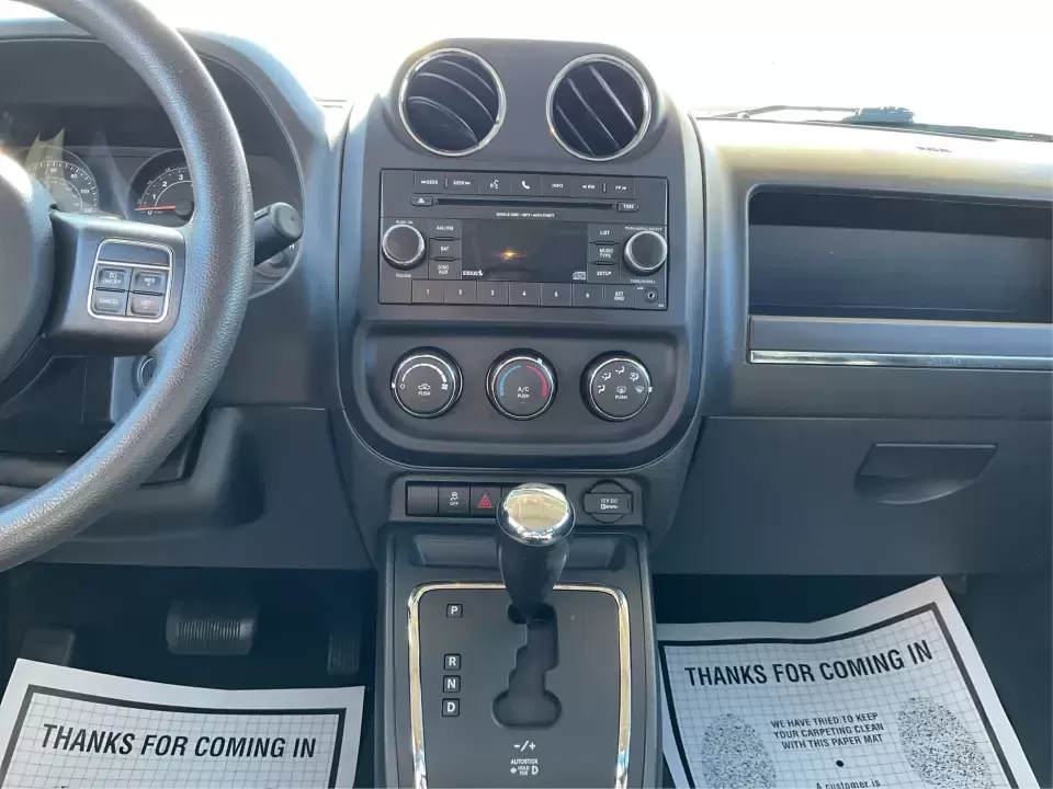 2016 Jeep Patriot Sport 2WD (1C4NJPBB6GD) with an 2.4L L4 DOHC 16V engine, Automatic transmission, located at 1951 S Dayton Lakeview Rd., New Carlisle, OH, 45344, (937) 908-9800, 39.890999, -84.050255 - Pack up the kids, load the cooler, and point the hood toward a weekend at Buck Creek State Park or an easy day trip to downtown Dayton-this 2016 Jeep Patriot Sport is the kind of compact SUV that fits real life in New Carlisle. With classic Jeep styling, practical cargo space, and everyday-friendly - Photo#13
