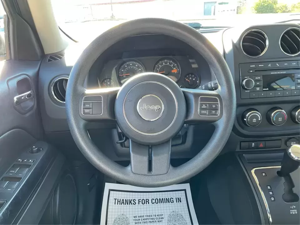 2016 Jeep Patriot Sport 2WD (1C4NJPBB6GD) with an 2.4L L4 DOHC 16V engine, Automatic transmission, located at 1951 S Dayton Lakeview Rd., New Carlisle, OH, 45344, (937) 908-9800, 39.890999, -84.050255 - Pack up the kids, load the cooler, and point the hood toward a weekend at Buck Creek State Park or an easy day trip to downtown Dayton-this 2016 Jeep Patriot Sport is the kind of compact SUV that fits real life in New Carlisle. With classic Jeep styling, practical cargo space, and everyday-friendly - Photo#16