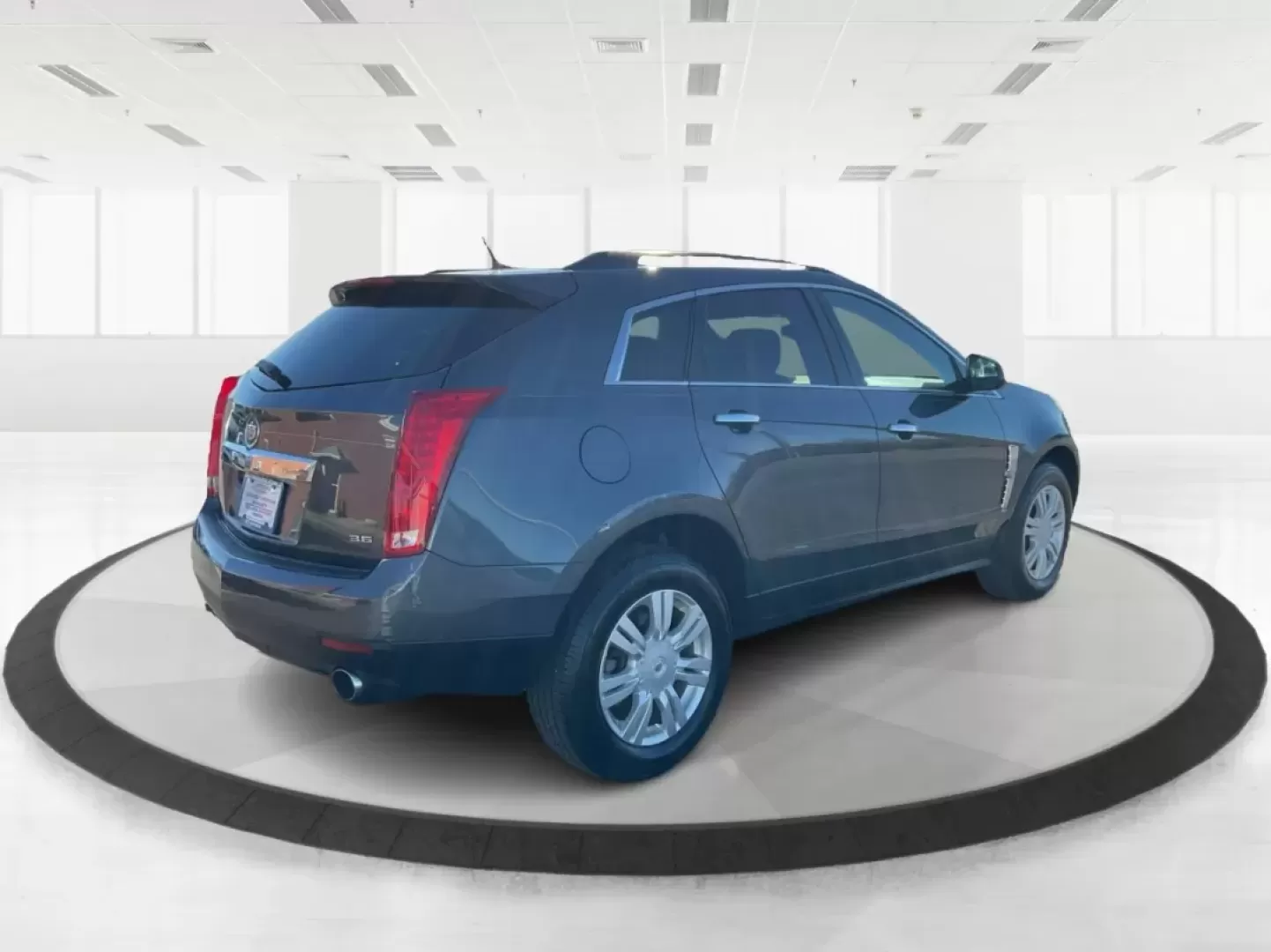 2012 Cadillac SRX Standard (3GYFNGE39CS) with an 3.6L V-6 gasoline direct injection engine, located at 1184 Kauffman Ave, Fairborn, OH, 45324, (937) 908-9800, 39.807072, -84.030914 - **Adventure Awaits with the 2012 Cadillac SRX Your Next Family SUV!**<br /> <br /> Are you on the hunt for a versatile vehicle that can handle your family's busy lifestyle and weekend adventures? Look no further than this stunning 2012 Cadillac SRX, available now at Advantage Car and Credit in Fair - Photo#2