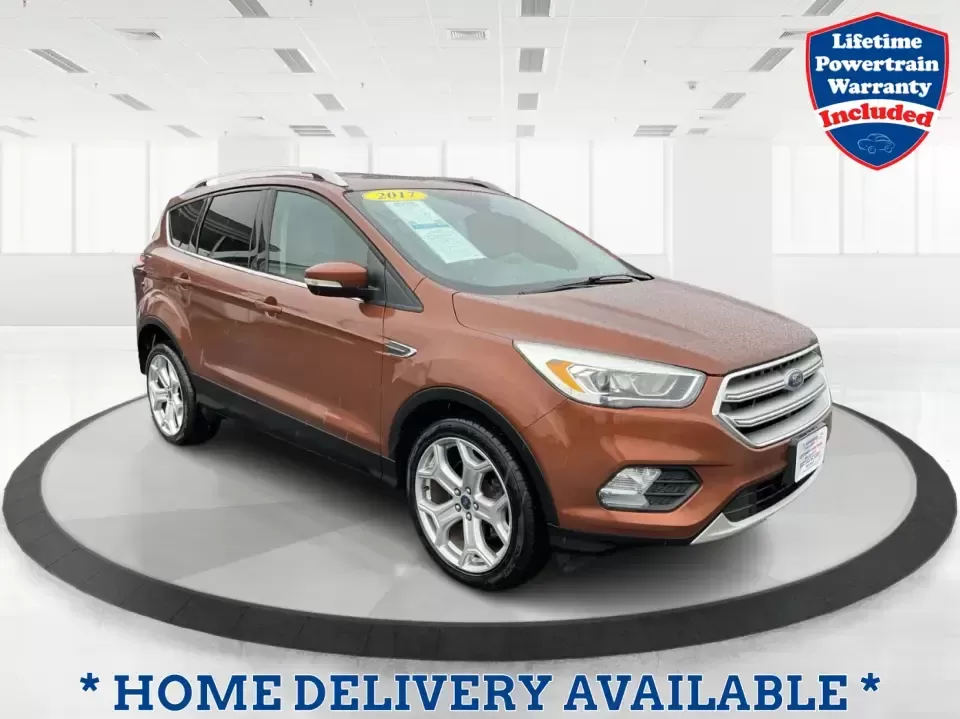 2017 Ford Escape Titanium 4WD (1FMCU9J94HU) with an 2.0L L4 DOHC 16V engine, 6A transmission, located at 8750 N County Rd 25A, Piqua, OH, 45356, (937) 908-9800, 40.164391, -84.232513 - Load up the family, point the hood toward Indian Lake for a weekend escape, or make your daily commute down I75 feel a lot more comfortable-this 2017 Ford Escape Titanium 4WD is the kind of compact SUV that fits real life in Piqua, OH. With confident four-wheel drive for unpredictable Midwest weathe - Photo#0