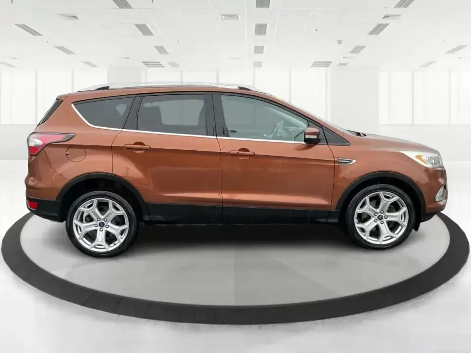 2017 Ford Escape Titanium 4WD (1FMCU9J94HU) with an 2.0L L4 DOHC 16V engine, 6A transmission, located at 8750 N County Rd 25A, Piqua, OH, 45356, (937) 908-9800, 40.164391, -84.232513 - Load up the family, point the hood toward Indian Lake for a weekend escape, or make your daily commute down I75 feel a lot more comfortable-this 2017 Ford Escape Titanium 4WD is the kind of compact SUV that fits real life in Piqua, OH. With confident four-wheel drive for unpredictable Midwest weathe - Photo#1