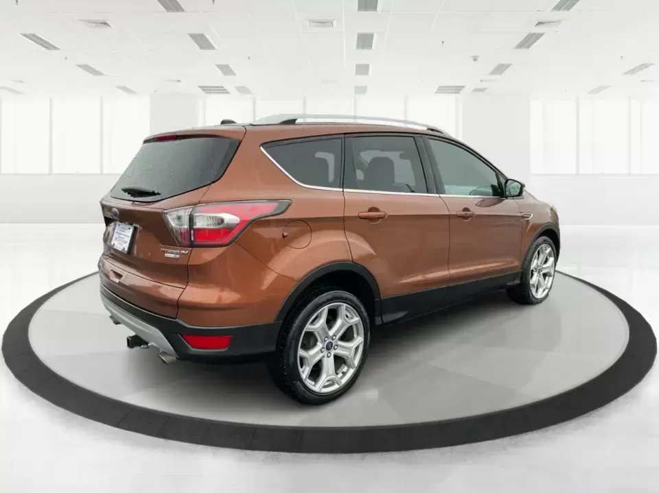 2017 Ford Escape Titanium 4WD (1FMCU9J94HU) with an 2.0L L4 DOHC 16V engine, 6A transmission, located at 8750 N County Rd 25A, Piqua, OH, 45356, (937) 908-9800, 40.164391, -84.232513 - Load up the family, point the hood toward Indian Lake for a weekend escape, or make your daily commute down I75 feel a lot more comfortable-this 2017 Ford Escape Titanium 4WD is the kind of compact SUV that fits real life in Piqua, OH. With confident four-wheel drive for unpredictable Midwest weathe - Photo#2