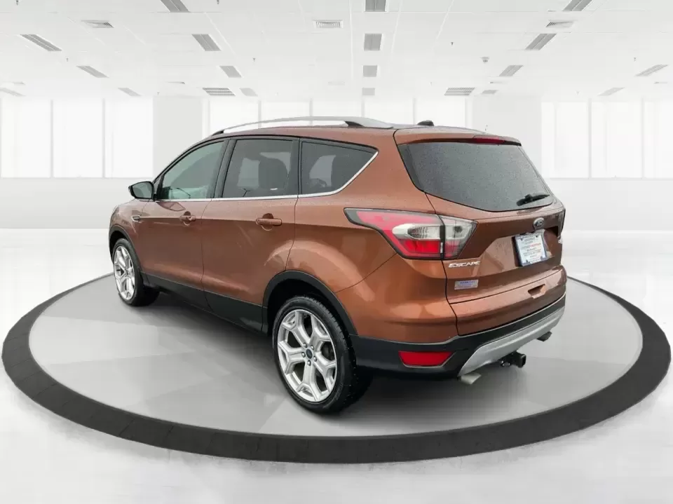 2017 Ford Escape Titanium 4WD (1FMCU9J94HU) with an 2.0L L4 DOHC 16V engine, 6A transmission, located at 8750 N County Rd 25A, Piqua, OH, 45356, (937) 908-9800, 40.164391, -84.232513 - Load up the family, point the hood toward Indian Lake for a weekend escape, or make your daily commute down I75 feel a lot more comfortable-this 2017 Ford Escape Titanium 4WD is the kind of compact SUV that fits real life in Piqua, OH. With confident four-wheel drive for unpredictable Midwest weathe - Photo#4
