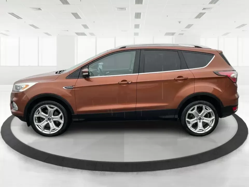 2017 Ford Escape Titanium 4WD (1FMCU9J94HU) with an 2.0L L4 DOHC 16V engine, 6A transmission, located at 8750 N County Rd 25A, Piqua, OH, 45356, (937) 908-9800, 40.164391, -84.232513 - Load up the family, point the hood toward Indian Lake for a weekend escape, or make your daily commute down I75 feel a lot more comfortable-this 2017 Ford Escape Titanium 4WD is the kind of compact SUV that fits real life in Piqua, OH. With confident four-wheel drive for unpredictable Midwest weathe - Photo#5