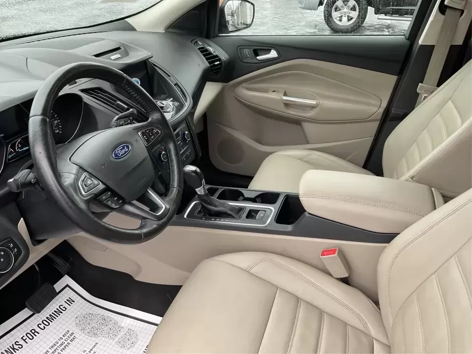 2017 Ford Escape Titanium 4WD (1FMCU9J94HU) with an 2.0L L4 DOHC 16V engine, 6A transmission, located at 8750 N County Rd 25A, Piqua, OH, 45356, (937) 908-9800, 40.164391, -84.232513 - Load up the family, point the hood toward Indian Lake for a weekend escape, or make your daily commute down I75 feel a lot more comfortable-this 2017 Ford Escape Titanium 4WD is the kind of compact SUV that fits real life in Piqua, OH. With confident four-wheel drive for unpredictable Midwest weathe - Photo#9