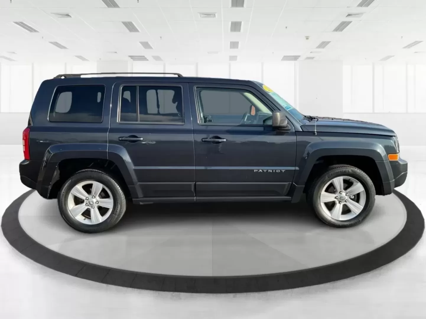 2015 Jeep Patriot Latitude (1C4NJRFB2FD) with an 2.4L I-4 DOHC engine, located at 8750 N County Rd 25A, Piqua, OH, 45356, (937) 908-9800, 40.164391, -84.232513 - **Explore the Open Road with Confidence in this 2015 Jeep Patriot Latitude!**<br /> <br /> Are you ready to embrace new adventures? This 2015 Jeep Patriot Latitude is the perfect companion for anyone looking to escape the hustle and bustle of daily life. With its sleek Maximum Steel Metallic Clearco - Photo#1
