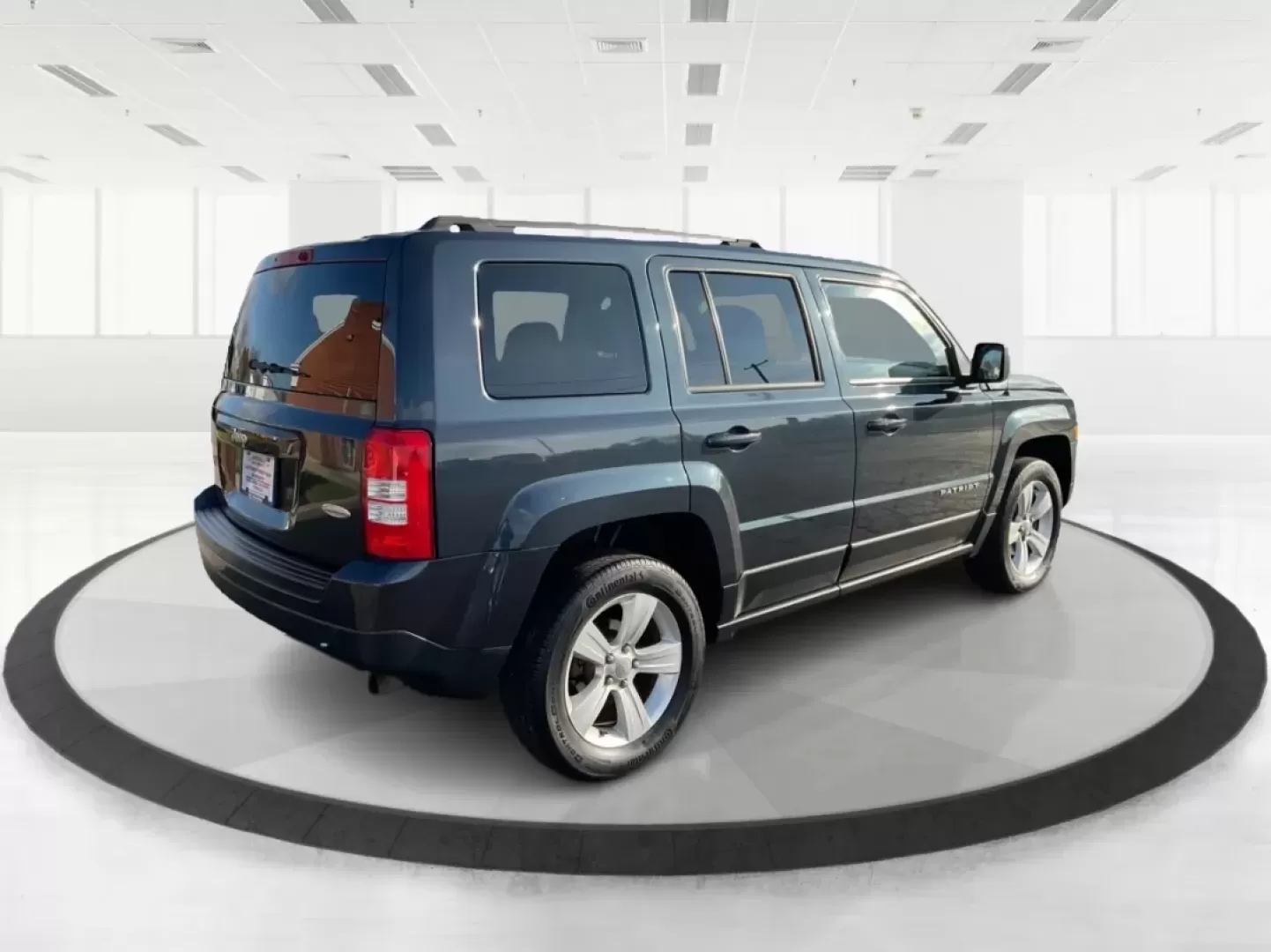 2015 Jeep Patriot Latitude (1C4NJRFB2FD) with an 2.4L I-4 DOHC engine, located at 8750 N County Rd 25A, Piqua, OH, 45356, (937) 908-9800, 40.164391, -84.232513 - **Explore the Open Road with Confidence in this 2015 Jeep Patriot Latitude!**<br /> <br /> Are you ready to embrace new adventures? This 2015 Jeep Patriot Latitude is the perfect companion for anyone looking to escape the hustle and bustle of daily life. With its sleek Maximum Steel Metallic Clearco - Photo#2
