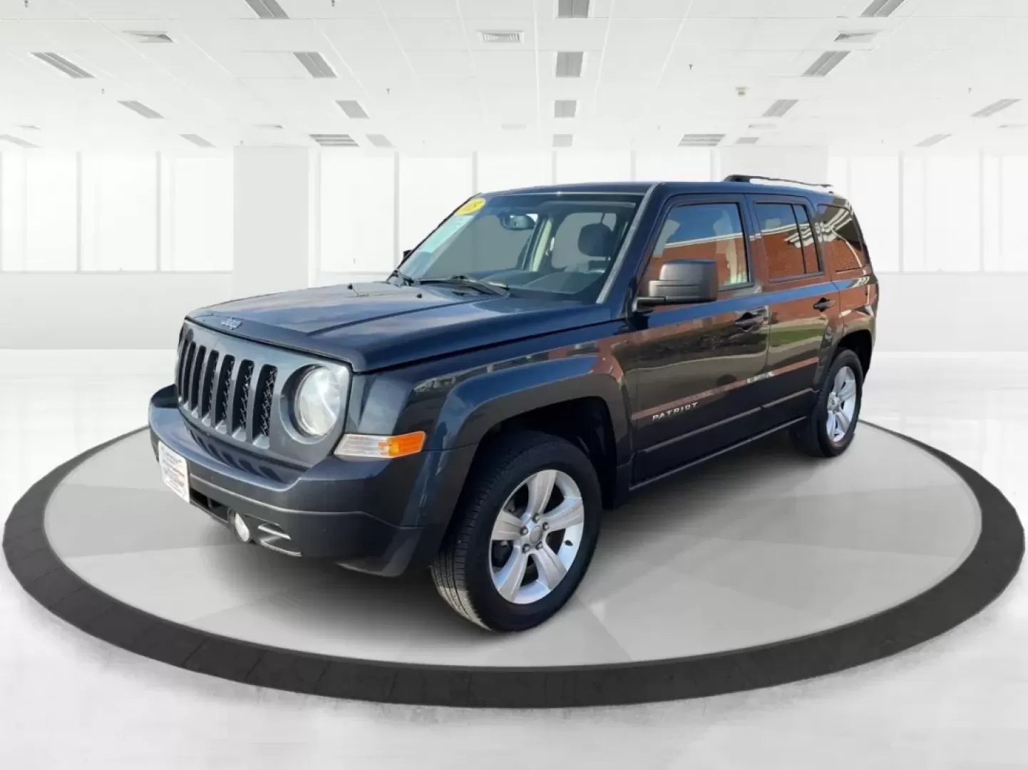 2015 Jeep Patriot Latitude (1C4NJRFB2FD) with an 2.4L I-4 DOHC engine, located at 8750 N County Rd 25A, Piqua, OH, 45356, (937) 908-9800, 40.164391, -84.232513 - **Explore the Open Road with Confidence in this 2015 Jeep Patriot Latitude!**<br /> <br /> Are you ready to embrace new adventures? This 2015 Jeep Patriot Latitude is the perfect companion for anyone looking to escape the hustle and bustle of daily life. With its sleek Maximum Steel Metallic Clearco - Photo#8