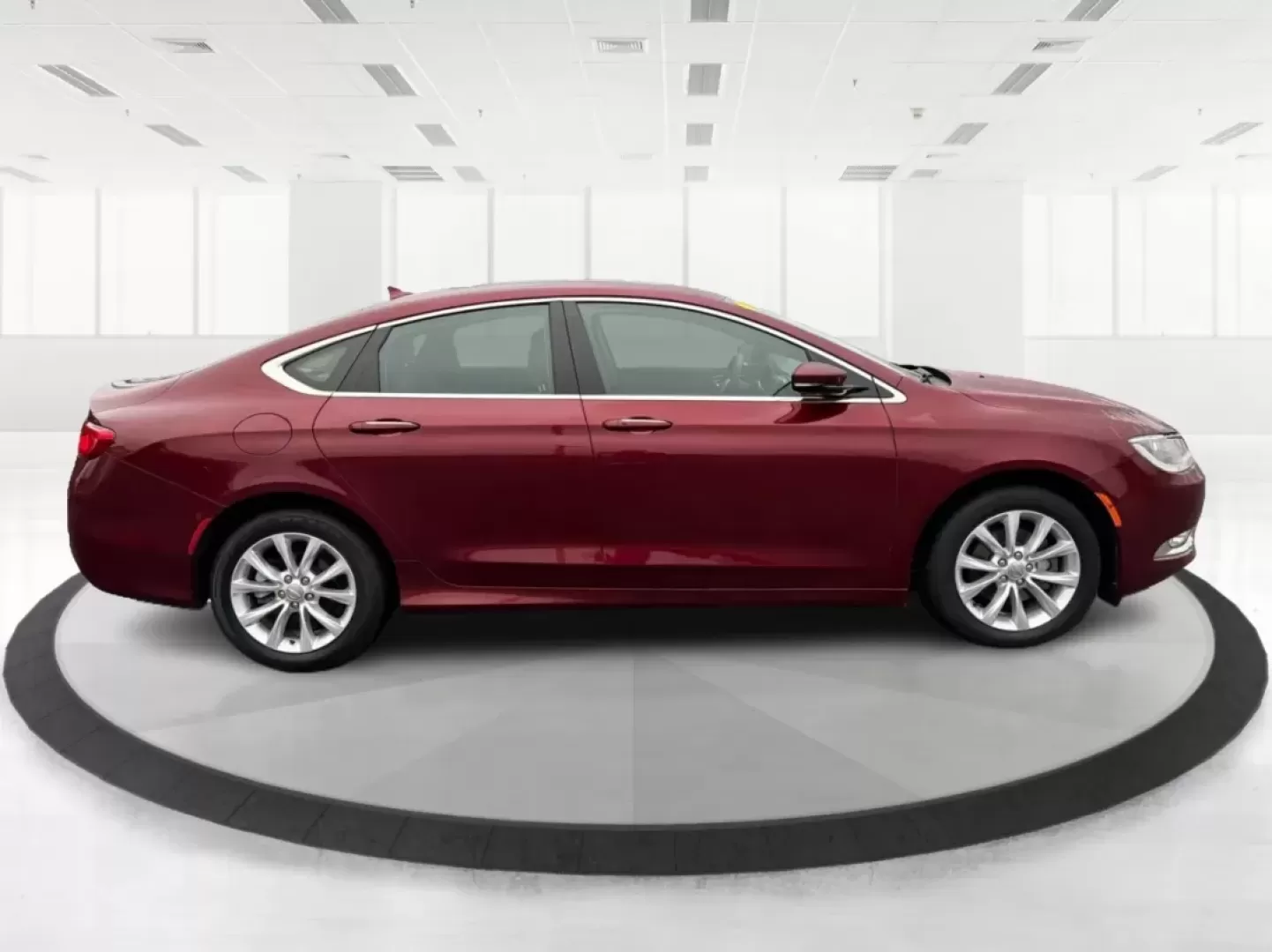 2016 Chrysler 200 C (1C3CCCCB1GN) with an Pentastar 3.6L V-6 DOHC engine, located at 401 Woodman Dr, Riverside, OH, 45431, (937) 908-9800, 39.760899, -84.123421 - **Drive Your Dreams with This 2016 Chrysler 200 Ideal for Everyday Adventures!**<br /> <br /> Are you seeking a versatile sedan that perfectly balances style, comfort, and performance for your daily commute or weekend getaways? Look no further! This stunning 2016 Chrysler 200, adorned in Velvet Red - Photo#1