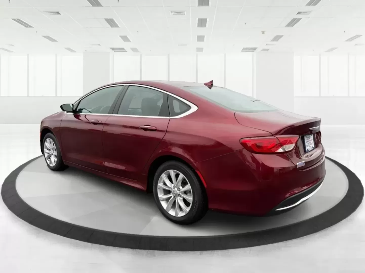 2016 Chrysler 200 C (1C3CCCCB1GN) with an Pentastar 3.6L V-6 DOHC engine, located at 401 Woodman Dr, Riverside, OH, 45431, (937) 908-9800, 39.760899, -84.123421 - **Drive Your Dreams with This 2016 Chrysler 200 Ideal for Everyday Adventures!**<br /> <br /> Are you seeking a versatile sedan that perfectly balances style, comfort, and performance for your daily commute or weekend getaways? Look no further! This stunning 2016 Chrysler 200, adorned in Velvet Red - Photo#4