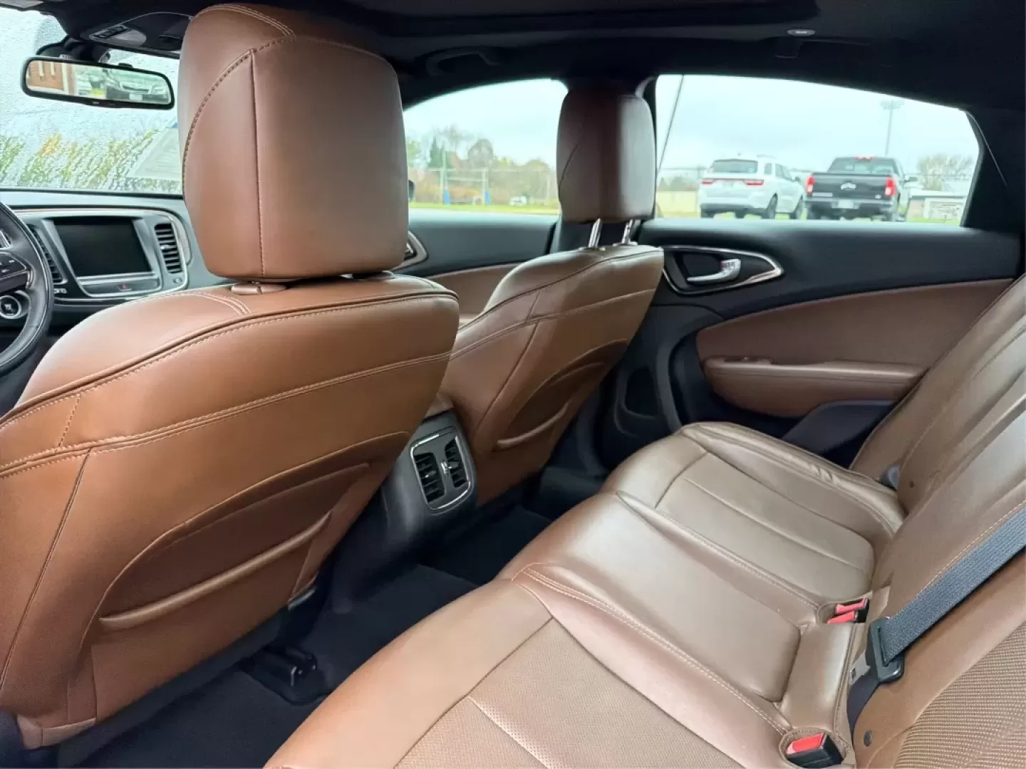 2016 Chrysler 200 C (1C3CCCCB1GN) with an Pentastar 3.6L V-6 DOHC engine, located at 401 Woodman Dr, Riverside, OH, 45431, (937) 908-9800, 39.760899, -84.123421 - **Drive Your Dreams with This 2016 Chrysler 200 Ideal for Everyday Adventures!**<br /> <br /> Are you seeking a versatile sedan that perfectly balances style, comfort, and performance for your daily commute or weekend getaways? Look no further! This stunning 2016 Chrysler 200, adorned in Velvet Red - Photo#10