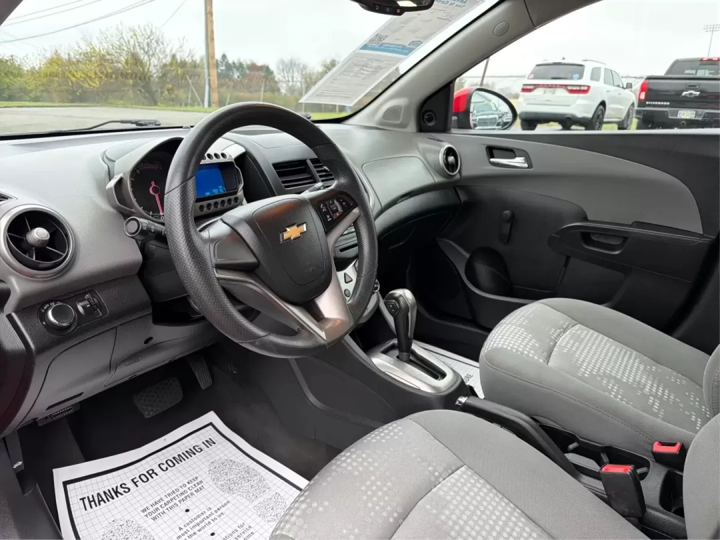 2014 Chevrolet Sonic LS Auto (1G1JA6SH1E4) with an Other engine, located at 1951 S Dayton Lakeview Rd., New Carlisle, OH, 45344, (937) 908-9800, 39.890999, -84.050255 - Are you in search of a reliable hatchback that perfectly balances style, efficiency, and practicality? Look no further than this stunning 2014 Chevrolet Sonic LS Auto, now available at Advantage Car and Credit in Riverside, OH. This vehicle is not just a mode of transportation; it's your new partner - Photo#9