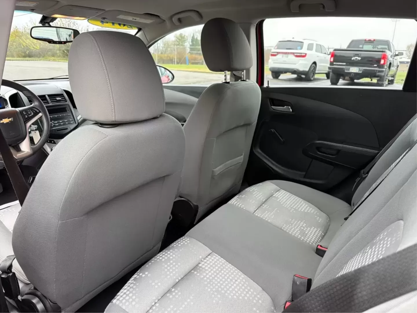 2014 Chevrolet Sonic LS Auto (1G1JA6SH1E4) with an Other engine, located at 1951 S Dayton Lakeview Rd., New Carlisle, OH, 45344, (937) 908-9800, 39.890999, -84.050255 - Are you in search of a reliable hatchback that perfectly balances style, efficiency, and practicality? Look no further than this stunning 2014 Chevrolet Sonic LS Auto, now available at Advantage Car and Credit in Riverside, OH. This vehicle is not just a mode of transportation; it's your new partner - Photo#10