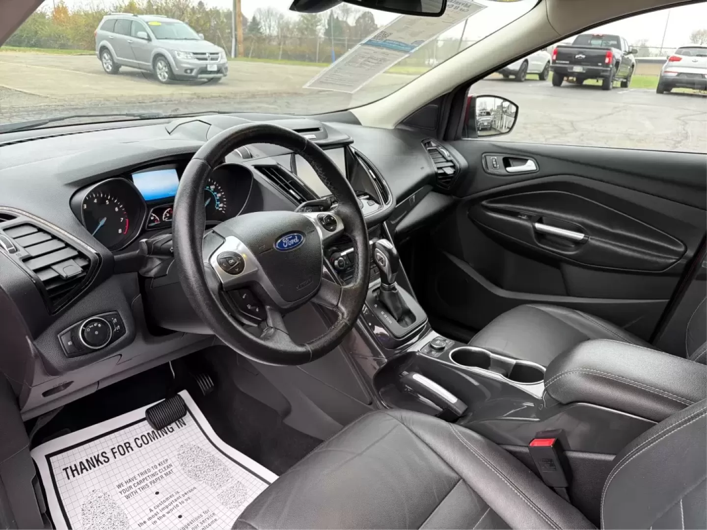 2015 Ford Escape Titanium (1FMCU0J96FU) with an Other engine, located at 401 Woodman Dr, Riverside, OH, 45431, (937) 908-9800, 39.760899, -84.123421 - **Adventure Awaits with the 2015 Ford Escape Titanium! Perfect for Family Road Trips and Daily Commuting!**<br /> <br /> Are you ready to take your adventures to the next level? This stunning Ruby Red Metallic Tinted Clearcoat 2015 Ford Escape Titanium is the ideal SUV for families, commuters, and w - Photo#9