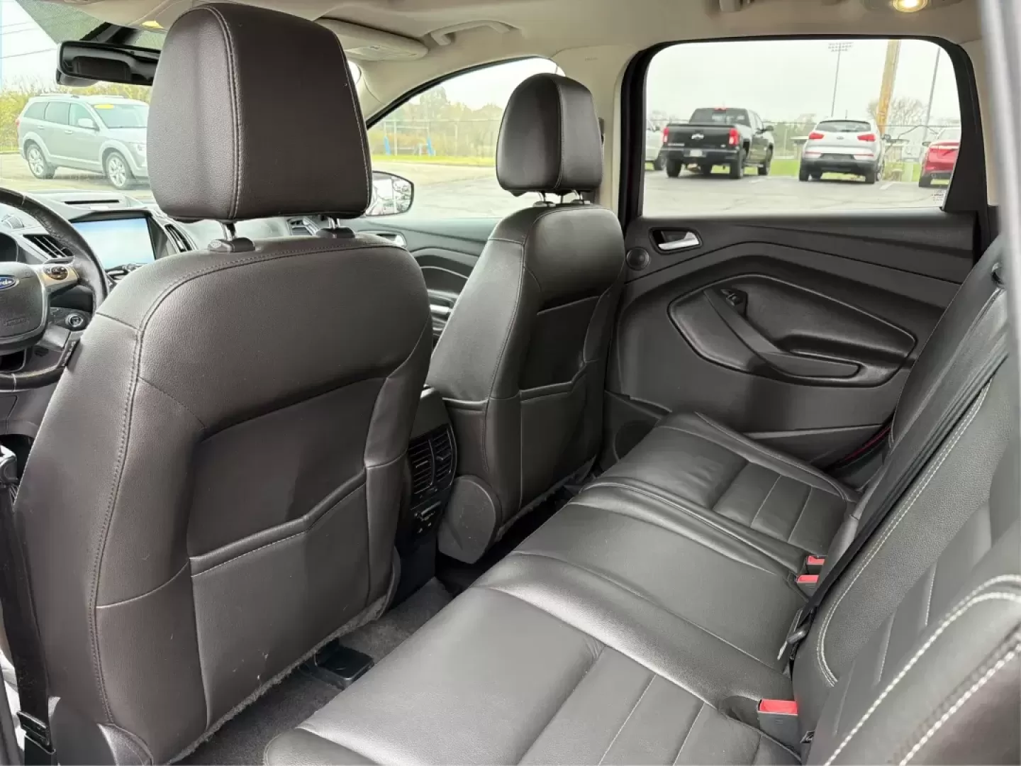 2015 Ford Escape Titanium (1FMCU0J96FU) with an Other engine, located at 401 Woodman Dr, Riverside, OH, 45431, (937) 908-9800, 39.760899, -84.123421 - **Adventure Awaits with the 2015 Ford Escape Titanium! Perfect for Family Road Trips and Daily Commuting!**<br /> <br /> Are you ready to take your adventures to the next level? This stunning Ruby Red Metallic Tinted Clearcoat 2015 Ford Escape Titanium is the ideal SUV for families, commuters, and w - Photo#10