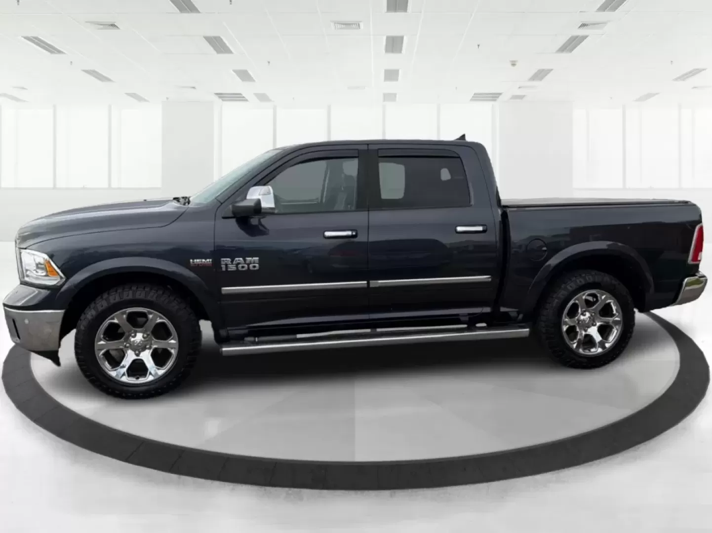 2014 Ram 1500 Laramie (1C6RR7NT8ES) with an Other engine, located at 1951 S Dayton Lakeview Rd., New Carlisle, OH, 45344, (937) 908-9800, 39.890999, -84.050255 - Are you ready to elevate your driving experience and tackle any adventure that comes your way? The 2014 Ram 1500 Laramie is not just a truck; it's an embodiment of capability, comfort, and style, making it perfect for those who lead an active lifestyle in New Carlisle, OH. Whether you're gearing up - Photo#5