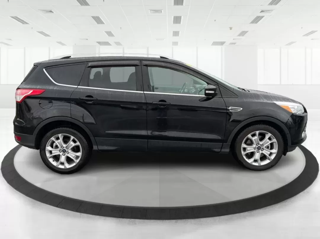 2016 Ford Escape Titanium (1FMCU0J94GU) with an Other engine, located at 1951 S Dayton Lakeview Rd., New Carlisle, OH, 45344, (937) 908-9800, 39.890999, -84.050255 - **Explore New Adventures with the 2016 Ford Escape Titanium Perfect for Families and Commuters Alike!**<br /> <br /> Are you ready to elevate your driving experience? The 2016 Ford Escape Titanium is the ideal companion for both bustling family life and daily commutes, bringing together style, comf - Photo#1
