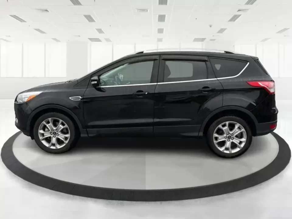 2016 Ford Escape Titanium (1FMCU0J94GU) with an 2.0L L4 DOHC 16V engine, 6-Speed Automatic transmission, located at 8750 N County Rd 25A, Piqua, OH, 45356, (937) 908-9800, 40.164391, -84.232513 - **Explore New Adventures with the 2016 Ford Escape Titanium Perfect for Families and Commuters Alike!**<br /> <br /> Are you ready to elevate your driving experience? The 2016 Ford Escape Titanium is the ideal companion for both bustling family life and daily commutes, bringing together style, comf - Photo#5