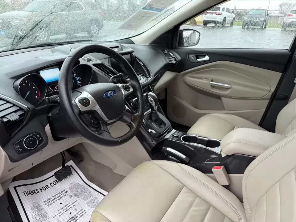 2016 Ford Escape Titanium (1FMCU0J94GU) with an 2.0L L4 DOHC 16V engine, 6-Speed Automatic transmission, located at 8750 N County Rd 25A, Piqua, OH, 45356, (937) 908-9800, 40.164391, -84.232513 - **Explore New Adventures with the 2016 Ford Escape Titanium Perfect for Families and Commuters Alike!**<br /> <br /> Are you ready to elevate your driving experience? The 2016 Ford Escape Titanium is the ideal companion for both bustling family life and daily commutes, bringing together style, comf - Photo#9