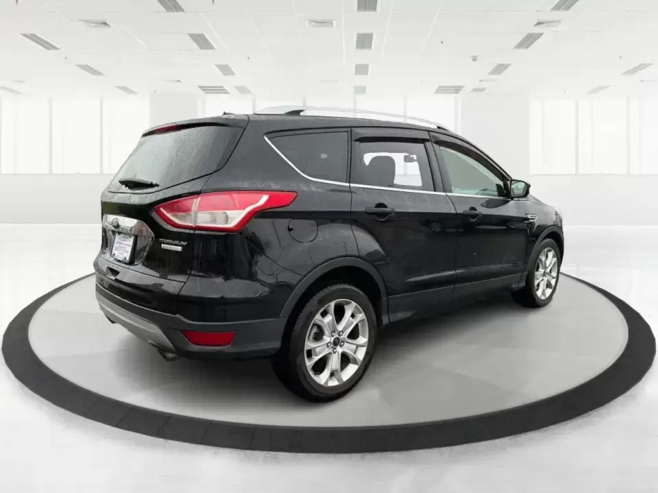 2016 Ford Escape Titanium (1FMCU0J94GU) with an 2.0L L4 DOHC 16V engine, 6-Speed Automatic transmission, located at 401 Woodman Dr, Riverside, OH, 45431, (937) 908-9800, 39.760899, -84.123421 - **Explore New Adventures with the 2016 Ford Escape Titanium Perfect for Families and Commuters Alike!**<br /> <br /> Are you ready to elevate your driving experience? The 2016 Ford Escape Titanium is the ideal companion for both bustling family life and daily commutes, bringing together style, comf - Photo#2