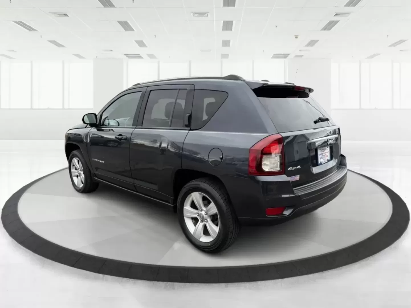 2014 Jeep Compass Latitude (1C4NJDEB3ED) with an 2.4L I-4 DOHC engine, located at 4508 South Dixie Dr, Moraine, OH, 45439, (937) 908-9800, 39.689976, -84.218452 - ### Explore the Open Road with Confidence in the 2014 Jeep Compass Latitude!<br /> <br /> Are you ready to embrace the freedom of adventure? The 2014 Jeep Compass Latitude is the perfect vehicle for those who crave a blend of rugged capability and family-friendly comfort. Whether you're planning a w - Photo#4