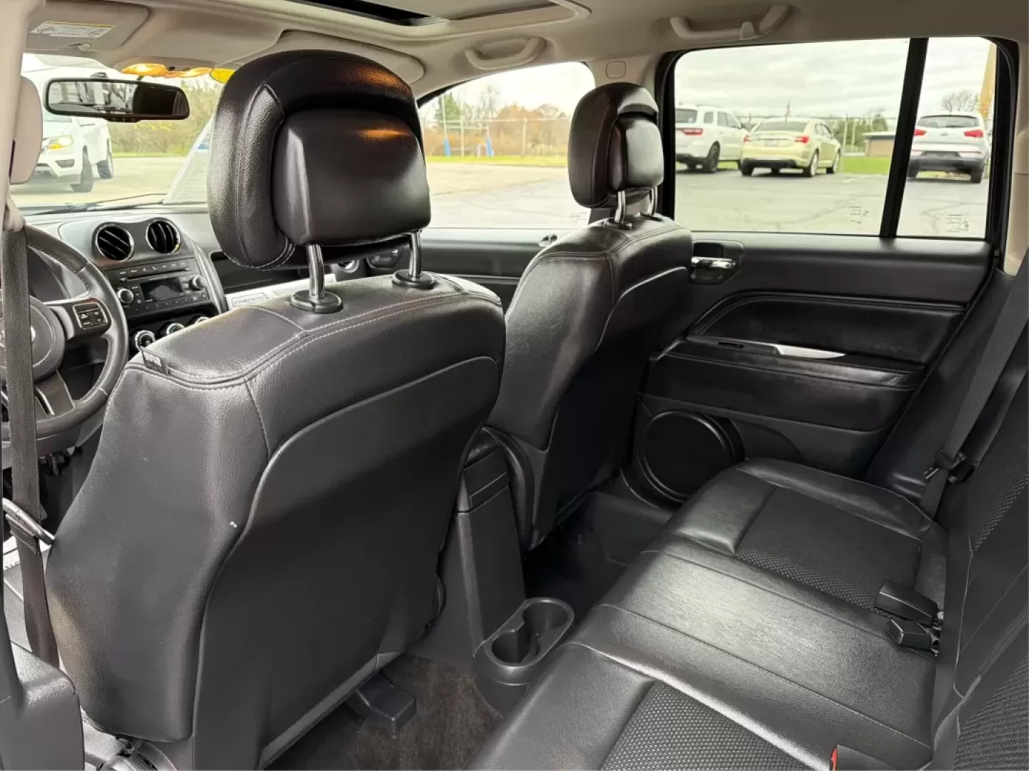 2014 Jeep Compass Latitude (1C4NJDEB3ED) with an 2.4L I-4 DOHC engine, located at 4508 South Dixie Dr, Moraine, OH, 45439, (937) 908-9800, 39.689976, -84.218452 - ### Explore the Open Road with Confidence in the 2014 Jeep Compass Latitude!<br /> <br /> Are you ready to embrace the freedom of adventure? The 2014 Jeep Compass Latitude is the perfect vehicle for those who crave a blend of rugged capability and family-friendly comfort. Whether you're planning a w - Photo#10