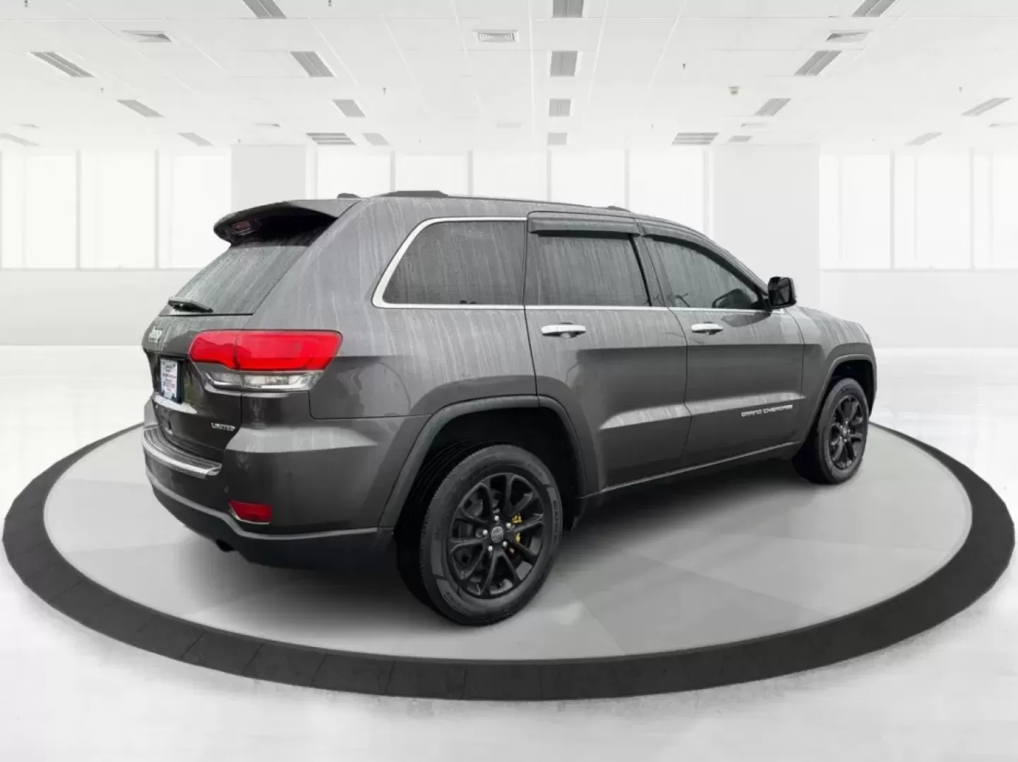 2014 Jeep Grand Cherokee Limited (1C4RJFBG9EC) with an Other engine, located at 880 E. National Road, Vandalia, OH, 45377, (937) 908-9800, 39.891918, -84.183594 - **Adventure Awaits: Drive Home a 2014 Jeep Grand Cherokee Limited Today!**<br /> <br /> Are you ready to elevate your driving experience? Picture yourself and your loved ones embarking on weekend getaways or daily commutes in the rugged yet refined 2014 Jeep Grand Cherokee Limited. This SUV isn't ju - Photo#2