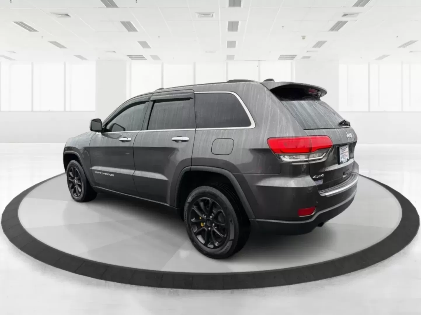 2014 Jeep Grand Cherokee Limited (1C4RJFBG9EC) with an Other engine, located at 880 E. National Road, Vandalia, OH, 45377, (937) 908-9800, 39.891918, -84.183594 - **Adventure Awaits: Drive Home a 2014 Jeep Grand Cherokee Limited Today!**<br /> <br /> Are you ready to elevate your driving experience? Picture yourself and your loved ones embarking on weekend getaways or daily commutes in the rugged yet refined 2014 Jeep Grand Cherokee Limited. This SUV isn't ju - Photo#4