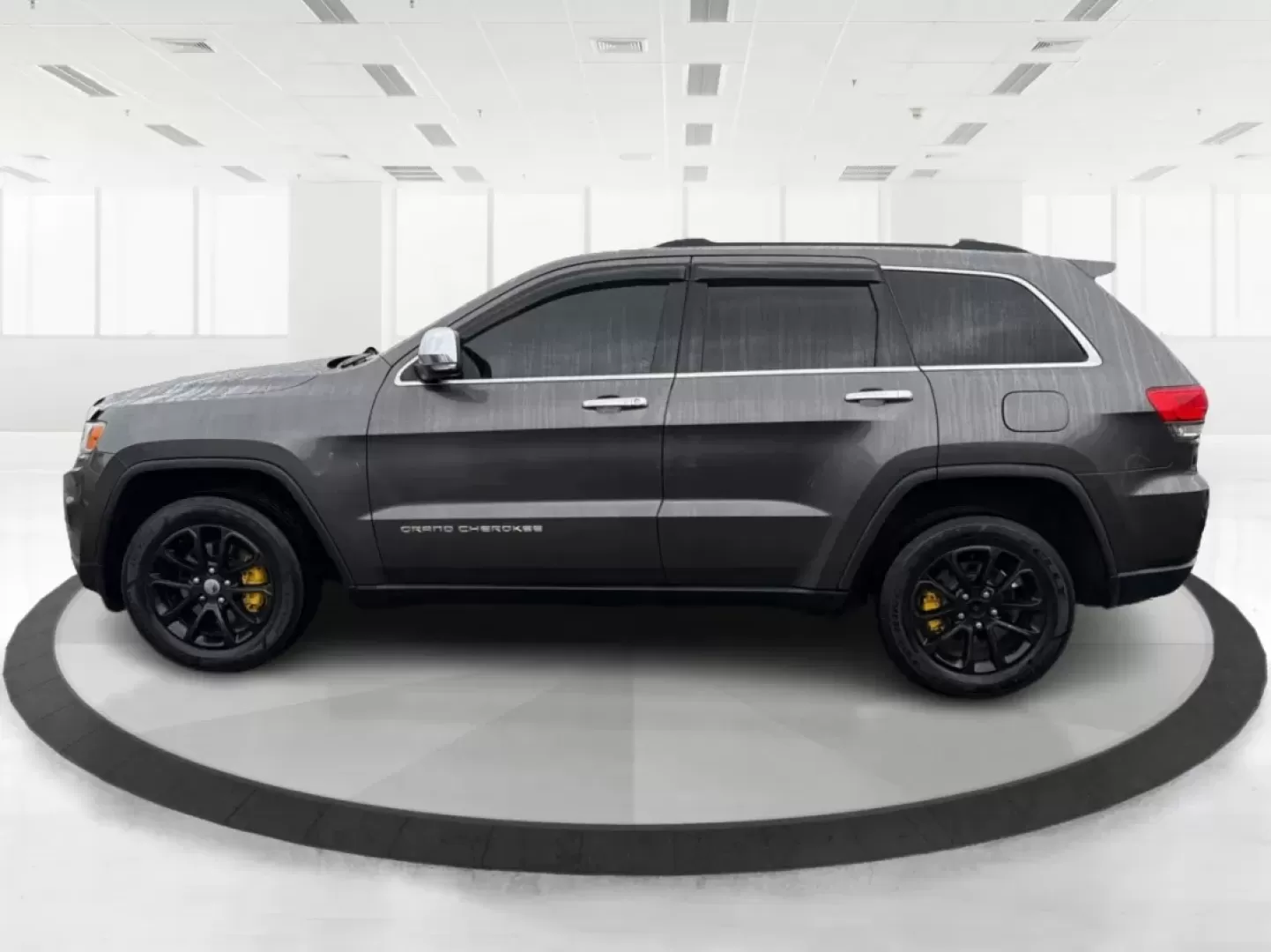 2014 Jeep Grand Cherokee Limited (1C4RJFBG9EC) with an Other engine, located at 880 E. National Road, Vandalia, OH, 45377, (937) 908-9800, 39.891918, -84.183594 - **Adventure Awaits: Drive Home a 2014 Jeep Grand Cherokee Limited Today!**<br /> <br /> Are you ready to elevate your driving experience? Picture yourself and your loved ones embarking on weekend getaways or daily commutes in the rugged yet refined 2014 Jeep Grand Cherokee Limited. This SUV isn't ju - Photo#5
