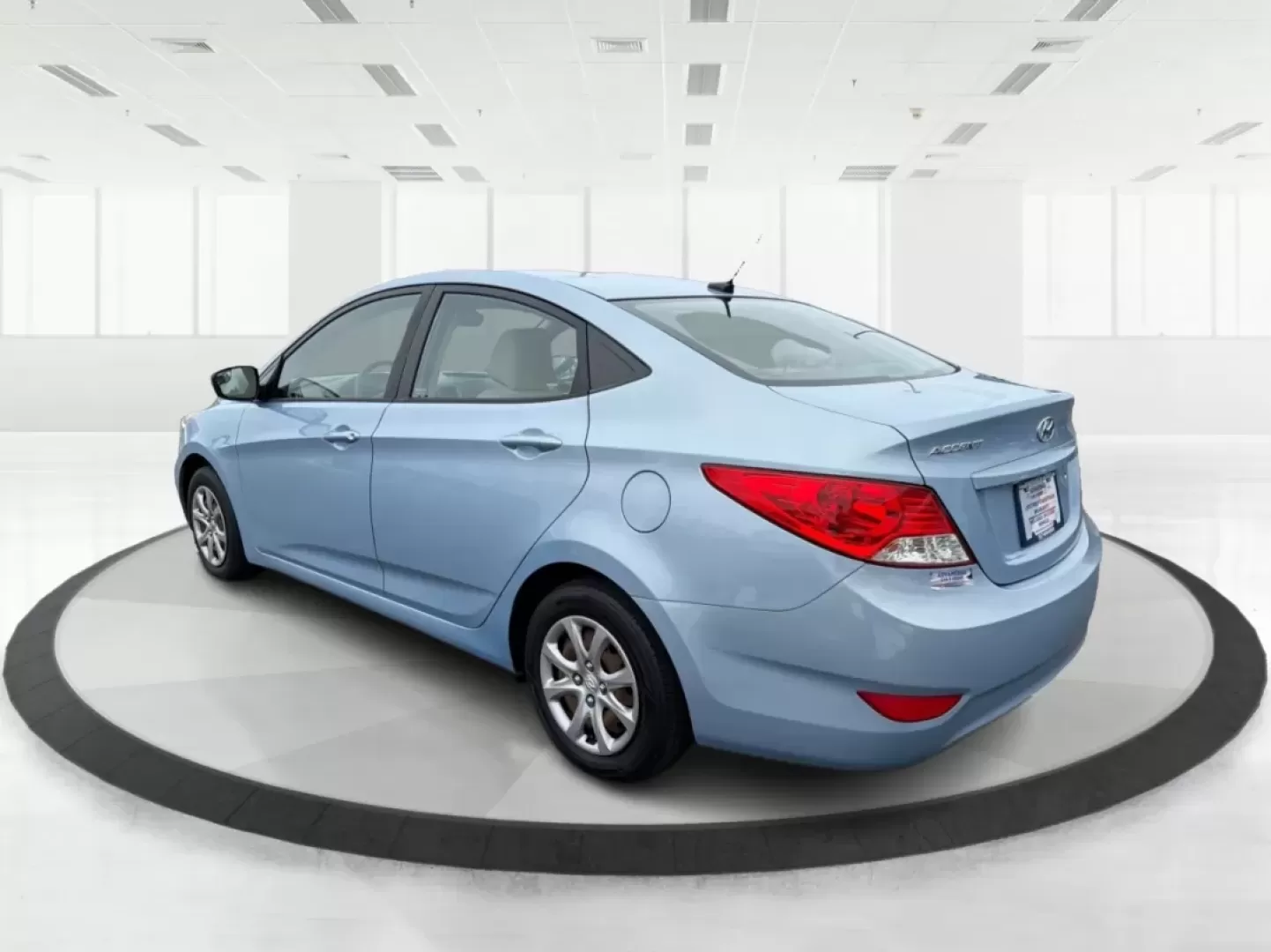 2014 Hyundai Accent GLS (KMHCT4AE6EU) with an 1.6L I-4 gasoline direct injection engine, located at 4508 South Dixie Dr, Moraine, OH, 45439, (937) 908-9800, 39.689976, -84.218452 - Discover the perfect blend of reliability and style with the 2014 Hyundai Accent GLS, an exceptional sedan ideally suited for budget-conscious buyers and those embarking on new journeys. Whether you're navigating the bustling streets of Moraine, OH, or taking a scenic drive through nearby Dayton, th - Photo#4