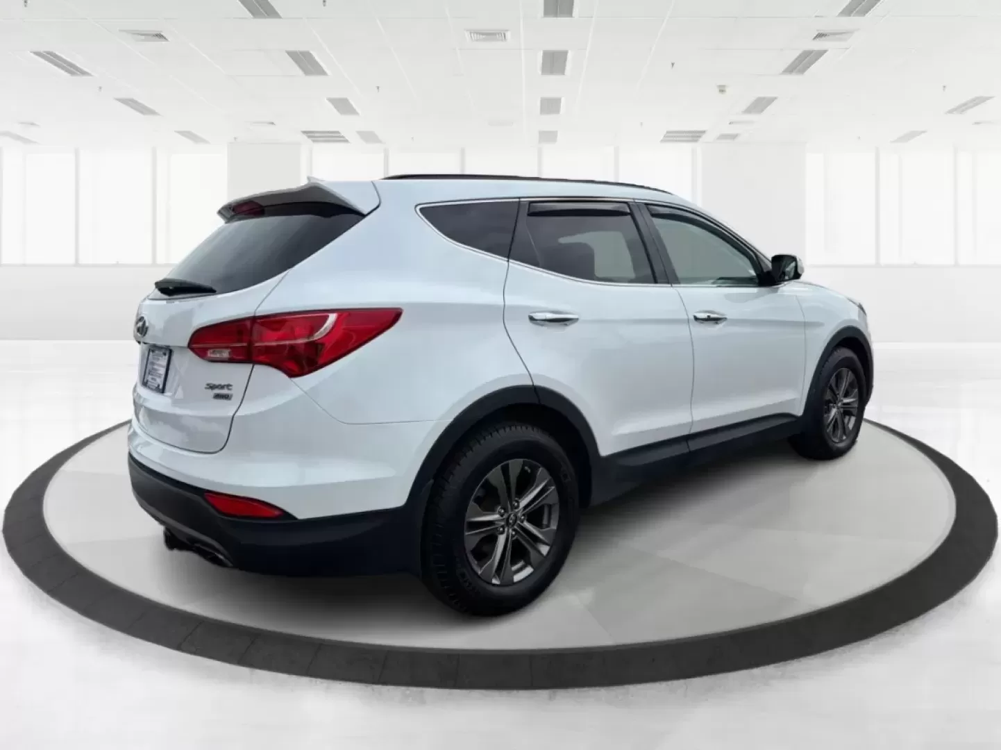 2014 Hyundai Santa Fe 2.4L (5XYZUDLB7EG) with an Theta II 2.4L I-4 gasoline direct injection engine, located at 1099 N County Rd 25A , Troy, OH, 45373, (937) 908-9800, 40.057079, -84.212883 - **Explore the Open Road with Ease: 2014 Hyundai Santa Fe at Advantage Car and Credit - Troy**<br /> <br /> Are you ready to take your family adventures to the next level? The 2014 Hyundai Santa Fe is designed for those seeking comfort, style, and ample space for everything life throws your way-perfe - Photo#2