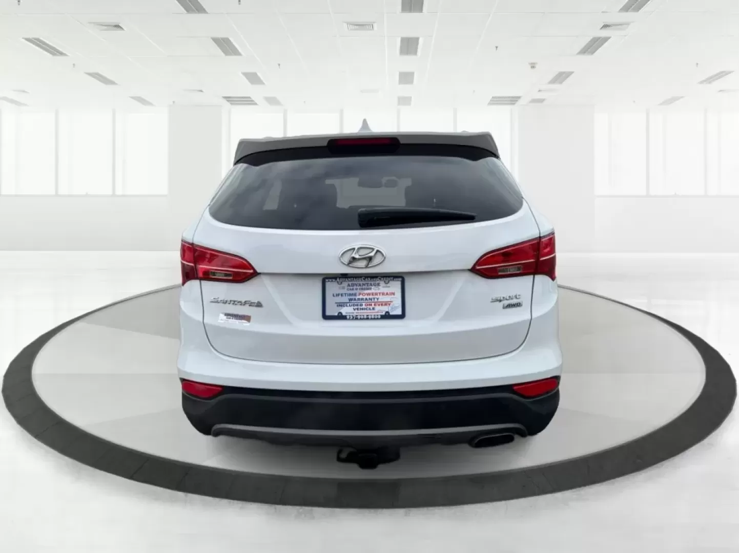 2014 Hyundai Santa Fe 2.4L (5XYZUDLB7EG) with an Theta II 2.4L I-4 gasoline direct injection engine, located at 1099 N County Rd 25A , Troy, OH, 45373, (937) 908-9800, 40.057079, -84.212883 - **Explore the Open Road with Ease: 2014 Hyundai Santa Fe at Advantage Car and Credit - Troy**<br /> <br /> Are you ready to take your family adventures to the next level? The 2014 Hyundai Santa Fe is designed for those seeking comfort, style, and ample space for everything life throws your way-perfe - Photo#3