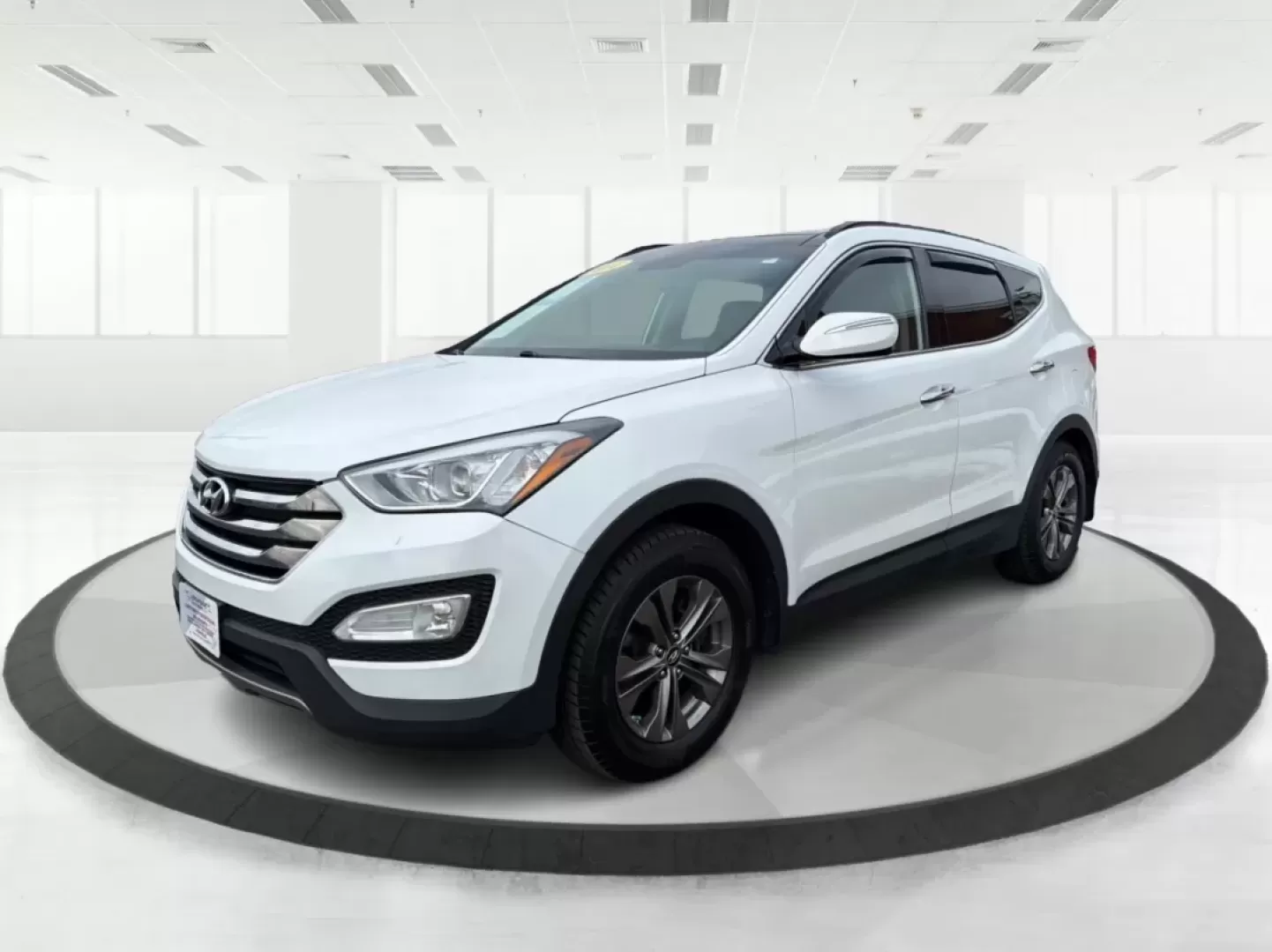 2014 Hyundai Santa Fe 2.4L (5XYZUDLB7EG) with an Theta II 2.4L I-4 gasoline direct injection engine, located at 1099 N County Rd 25A , Troy, OH, 45373, (937) 908-9800, 40.057079, -84.212883 - **Explore the Open Road with Ease: 2014 Hyundai Santa Fe at Advantage Car and Credit - Troy**<br /> <br /> Are you ready to take your family adventures to the next level? The 2014 Hyundai Santa Fe is designed for those seeking comfort, style, and ample space for everything life throws your way-perfe - Photo#8