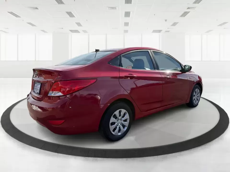 2016 Hyundai Accent SE 4-Door 6A (KMHCT4AE7GU) with an 1.6L L4 DOHC 16V engine, 6A transmission, located at 880 E. National Road, Vandalia, OH, 45377, (937) 908-9800, 39.891918, -84.183594 - Need a smart, budget-friendly commuter that still feels comfortable for everyday life around Vandalia and the Dayton area? This **2016 Hyundai Accent SE** in **Boston Red Metallic** is a practical sedan for busy schedules-perfect for the daily run up **I75**, quick errands along **E. National Road** - Photo#2