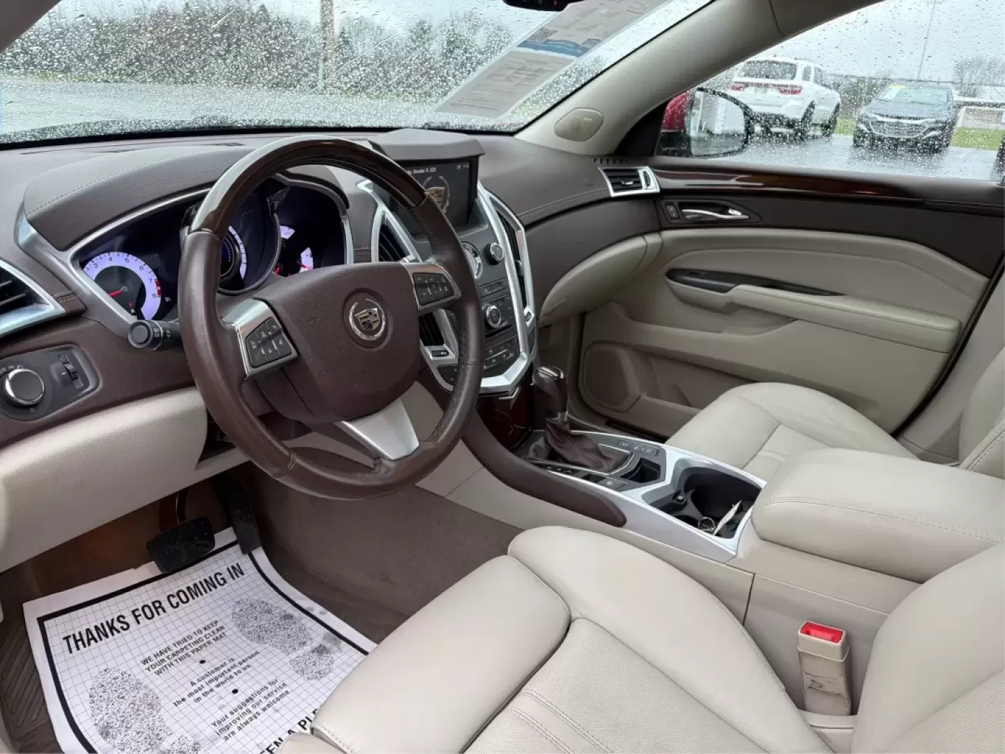 2012 Cadillac SRX Luxury Collection (3GYFNDE30CS) with an 3.6L V-6 gasoline direct injection engine, located at 8750 N County Rd 25A, Piqua, OH, 45356, (937) 908-9800, 40.164391, -84.232513 - **Elevate Your Daily Drive with the 2012 Cadillac SRX Luxury Collection!**<br /> <br /> Are you ready to upgrade your lifestyle with a vehicle that combines style, comfort, and versatility? The 2012 Cadillac SRX Luxury Collection is perfect for those who want an SUV that can manage everything from d - Photo#9