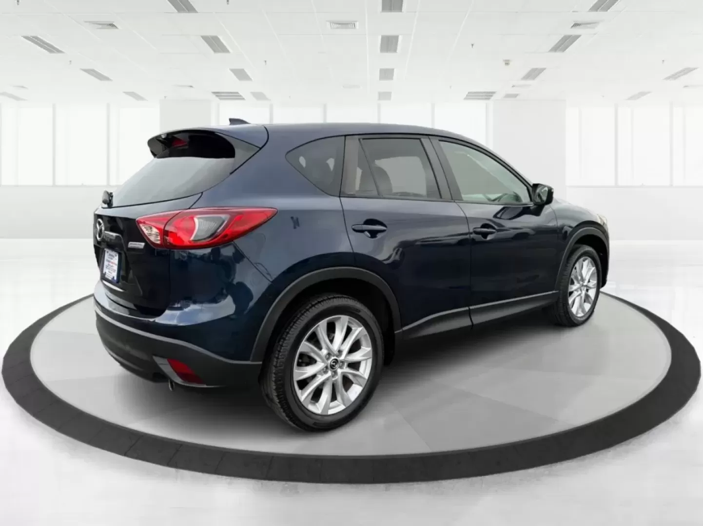 2015 Mazda CX-5 Grand Touring (JM3KE2DY9F0) with an SKYACTIV-G 2.5L I-4 gasoline direct injection engine, located at 1951 S Dayton Lakeview Rd., New Carlisle, OH, 45344, (937) 908-9800, 39.890999, -84.050255 - **Discover Adventure with the 2015 Mazda CX-5 at Advantage Car and Credit New Carlisle!**<br /> <br /> Are you ready to elevate your driving experience? Whether you're a growing family in need of space, a commuter looking for reliability, or an adventurer seeking the perfect weekend getaway vehicle - Photo#2
