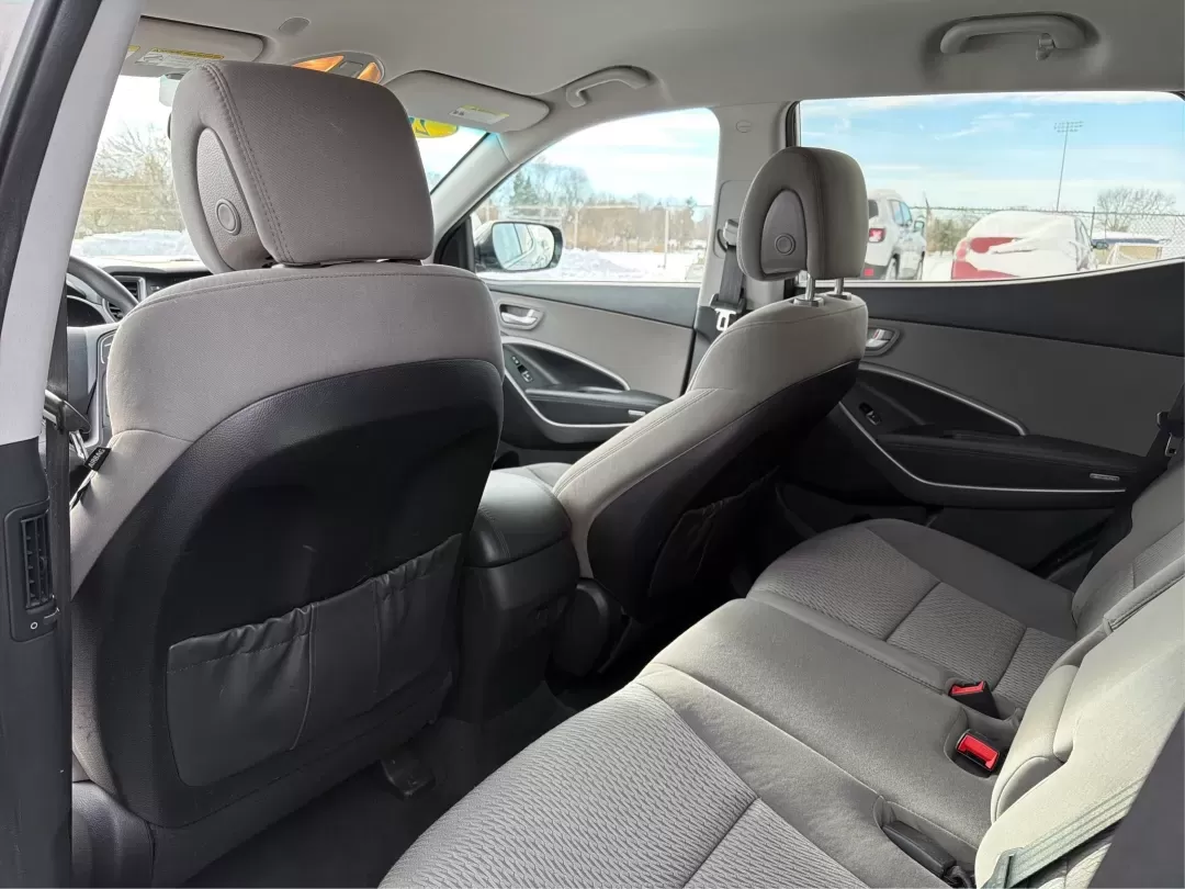 2016 Hyundai Santa Fe 2.4L (5XYZTDLB1GG) with an Theta II 2.4L I-4 gasoline direct injection engine, located at 1099 N County Rd 25A , Troy, OH, 45373, (937) 908-9800, 40.057079, -84.212883 - ### Embrace Your Adventurous Lifestyle with the 2016 Hyundai Santa Fe at Advantage Car and Credit - Troy!<br /> <br /> Are you ready to elevate your weekend escapes or daily commutes? Look no further than this stunning 2016 Hyundai Santa Fe, a versatile SUV designed for those who crave adventure and - Photo#10