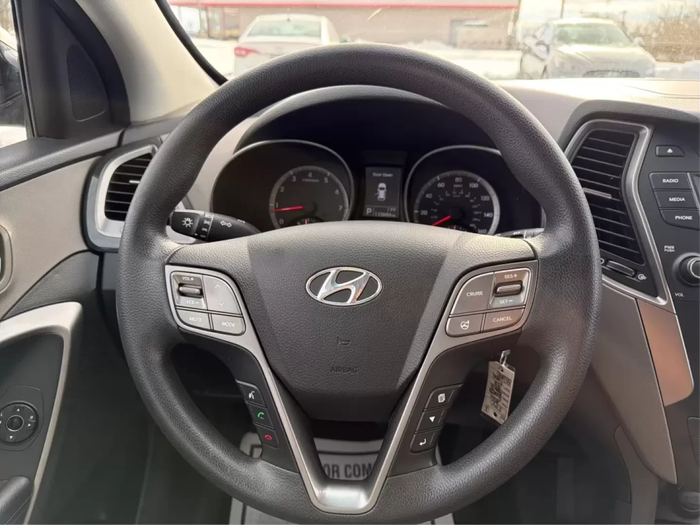 2016 Hyundai Santa Fe 2.4L (5XYZTDLB1GG) with an Theta II 2.4L I-4 gasoline direct injection engine, located at 1099 N County Rd 25A , Troy, OH, 45373, (937) 908-9800, 40.057079, -84.212883 - ### Embrace Your Adventurous Lifestyle with the 2016 Hyundai Santa Fe at Advantage Car and Credit - Troy!<br /> <br /> Are you ready to elevate your weekend escapes or daily commutes? Look no further than this stunning 2016 Hyundai Santa Fe, a versatile SUV designed for those who crave adventure and - Photo#16