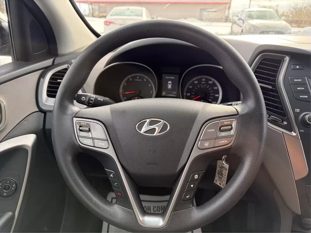 2016 Hyundai Santa Fe 2.4L (5XYZTDLB1GG) with an Theta II 2.4L I-4 gasoline direct injection engine, located at 1099 N County Rd 25A , Troy, OH, 45373, (937) 908-9800, 40.057079, -84.212883 - ### Embrace Your Adventurous Lifestyle with the 2016 Hyundai Santa Fe at Advantage Car and Credit - Troy!<br /> <br /> Are you ready to elevate your weekend escapes or daily commutes? Look no further than this stunning 2016 Hyundai Santa Fe, a versatile SUV designed for those who crave adventure and - Photo#16