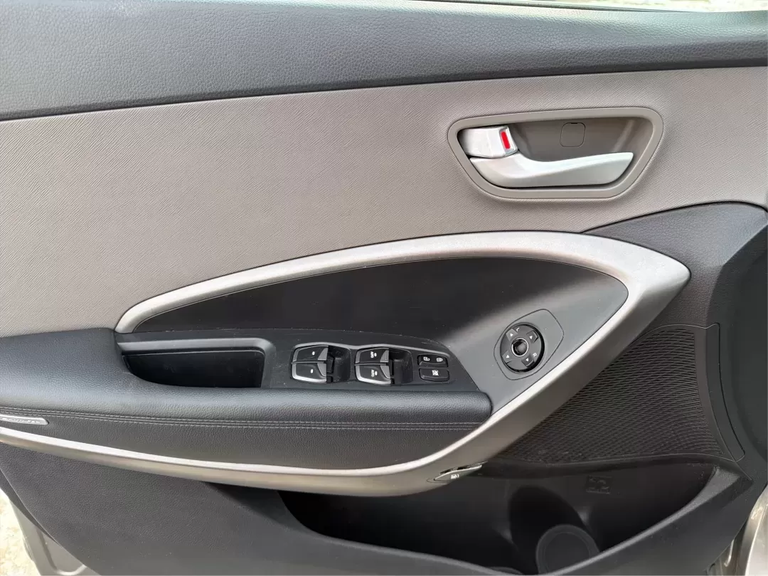 2016 Hyundai Santa Fe 2.4L (5XYZTDLB1GG) with an Theta II 2.4L I-4 gasoline direct injection engine, located at 1099 N County Rd 25A , Troy, OH, 45373, (937) 908-9800, 40.057079, -84.212883 - ### Embrace Your Adventurous Lifestyle with the 2016 Hyundai Santa Fe at Advantage Car and Credit - Troy!<br /> <br /> Are you ready to elevate your weekend escapes or daily commutes? Look no further than this stunning 2016 Hyundai Santa Fe, a versatile SUV designed for those who crave adventure and - Photo#17