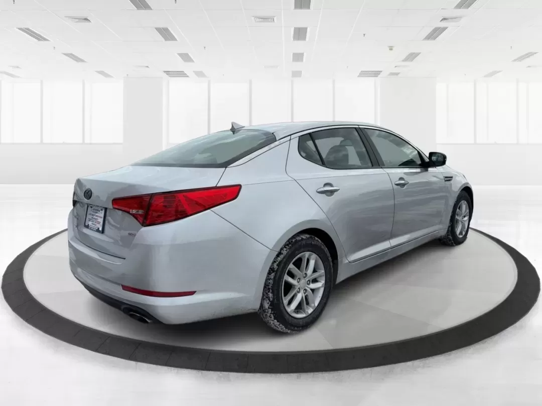 2013 Kia Optima LX (KNAGM4A74D5) with an 2.4L I-4 gasoline direct injection engine, located at 880 E. National Road, Vandalia, OH, 45377, (937) 908-9800, 39.891918, -84.183594 - **Discover Adventure with the 2013 Kia Optima LX at Advantage Car and Credit - Vandalia!** <br /> <br /> Are you ready to elevate your daily drive? Whether you're commuting to work, running errands, or planning a weekend getaway, the 2013 Kia Optima LX is the ideal sedan that seamlessly fits into y - Photo#2