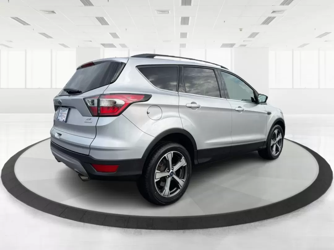 2017 Ford Escape SE (1FMCU0G95HU) with an Other engine, located at 8750 N County Rd 25A, Piqua, OH, 45356, (937) 908-9800, 40.164391, -84.232513 - Are you ready to elevate your lifestyle with a vehicle that perfectly balances comfort, versatility, and affordability? Look no further than the stunning 2017 Ford Escape SE, available now at Advantage Car and Credit - Piqua. This SUV is not just a vehicle; it's your new partner for family outings, - Photo#2